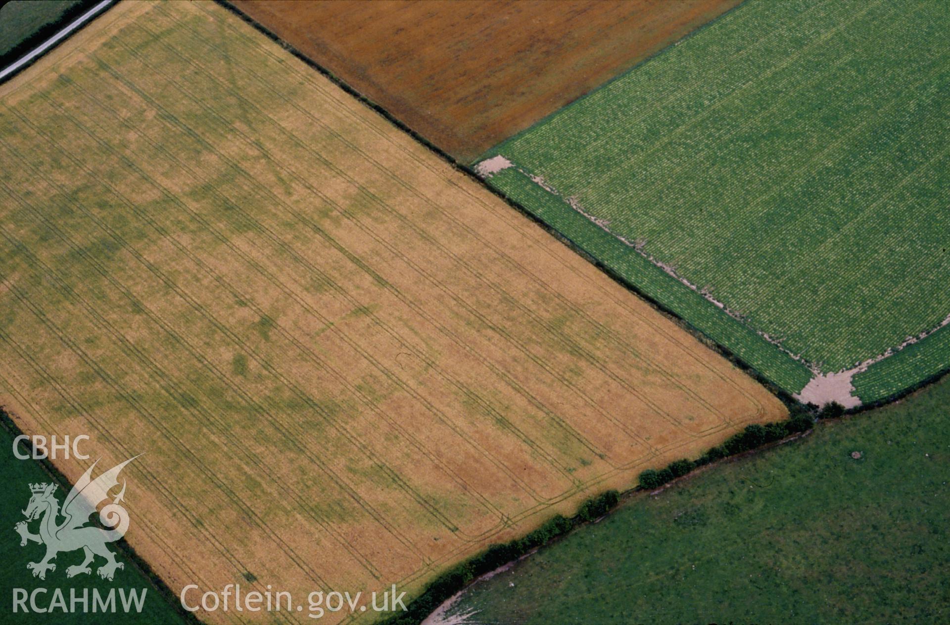 RCAHMW colour slide oblique aerial photograph of Hindwell Pallisaded Enclosure, Old Radnor, taken by C.R. Musson, 05/08/94