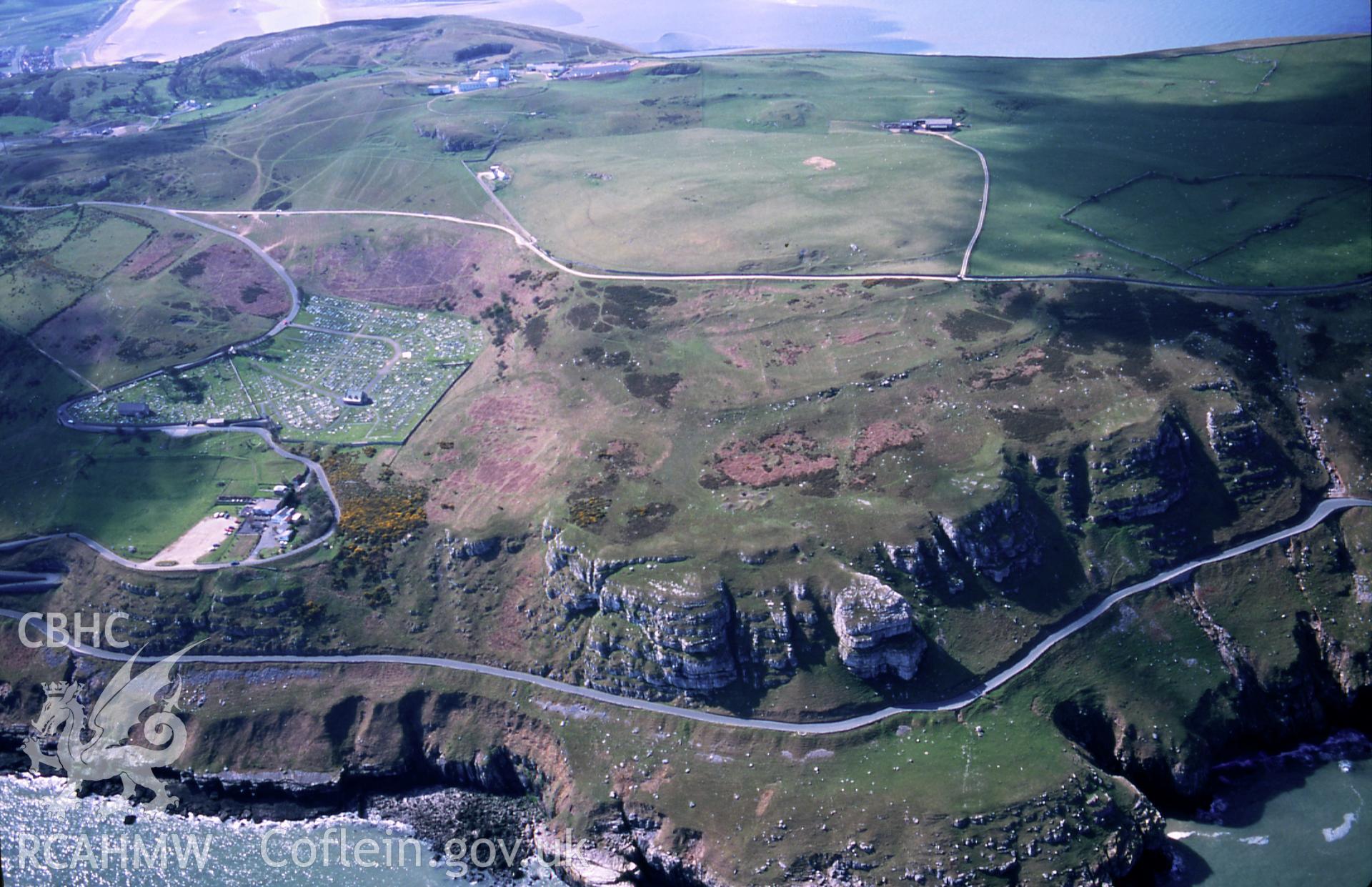 RCAHMW colour slide oblique aerial photograph of Hwylfa'r Ceirw Stone Alignment, Llandudno, taken on 18/04/1998 by Toby Driver