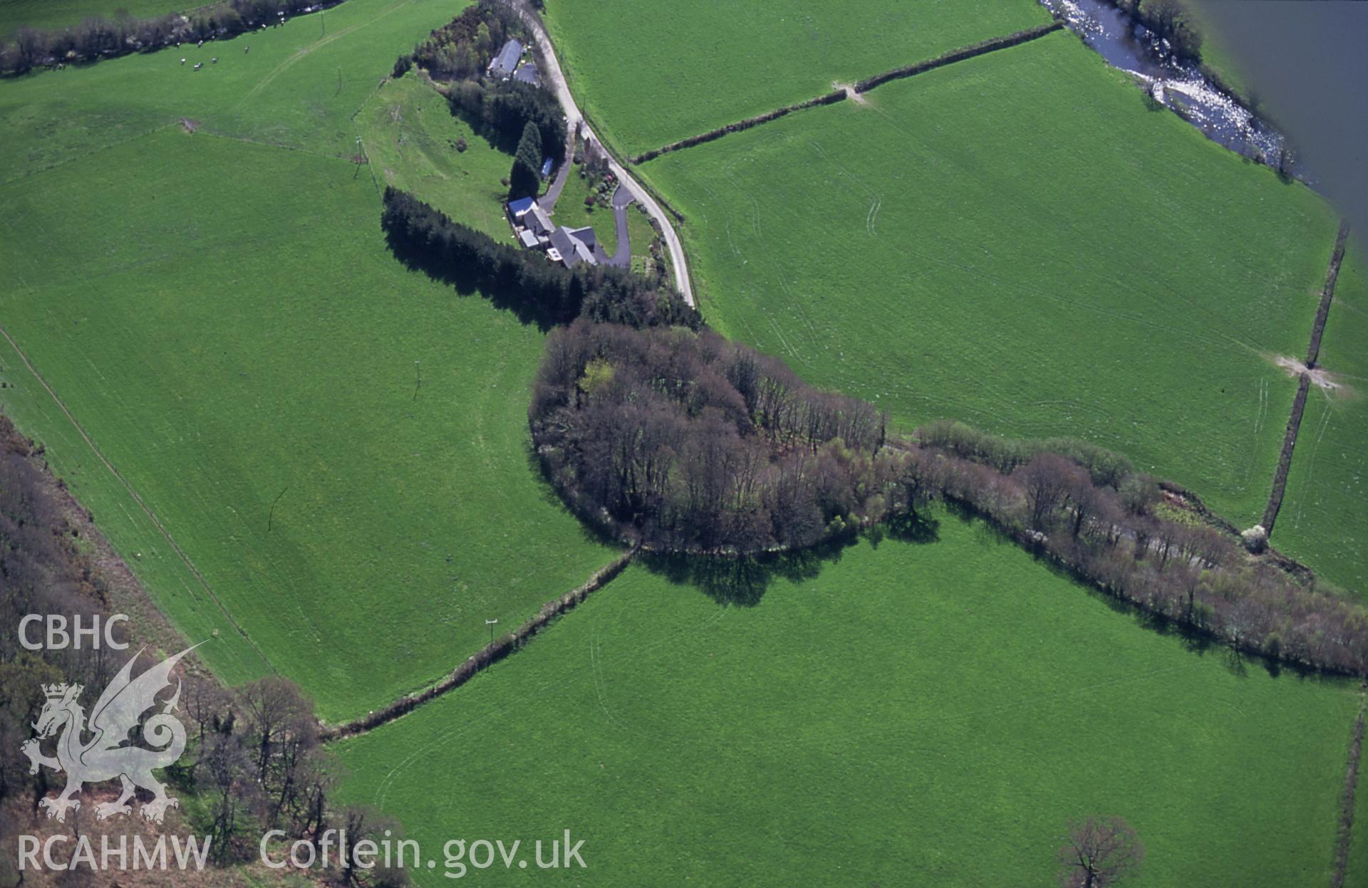 RCAHMW colour slide oblique aerial photograph of Castell Gwynionydd, Llandysul, taken by C.R.Musson on the 04/05/1996