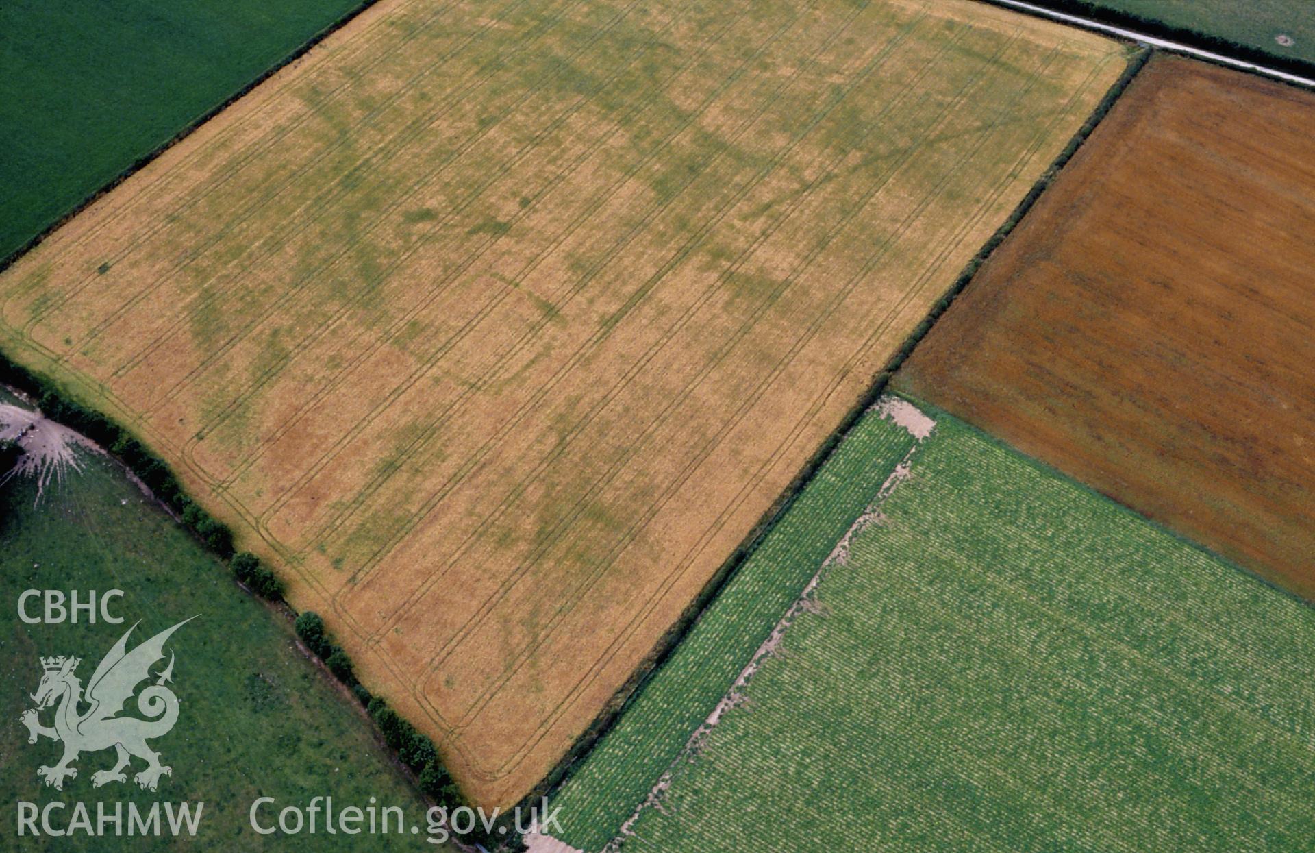 RCAHMW colour slide oblique aerial photograph of Hindwell Pallisaded Enclosure, Old Radnor, taken by C.R. Musson, 05/08/94