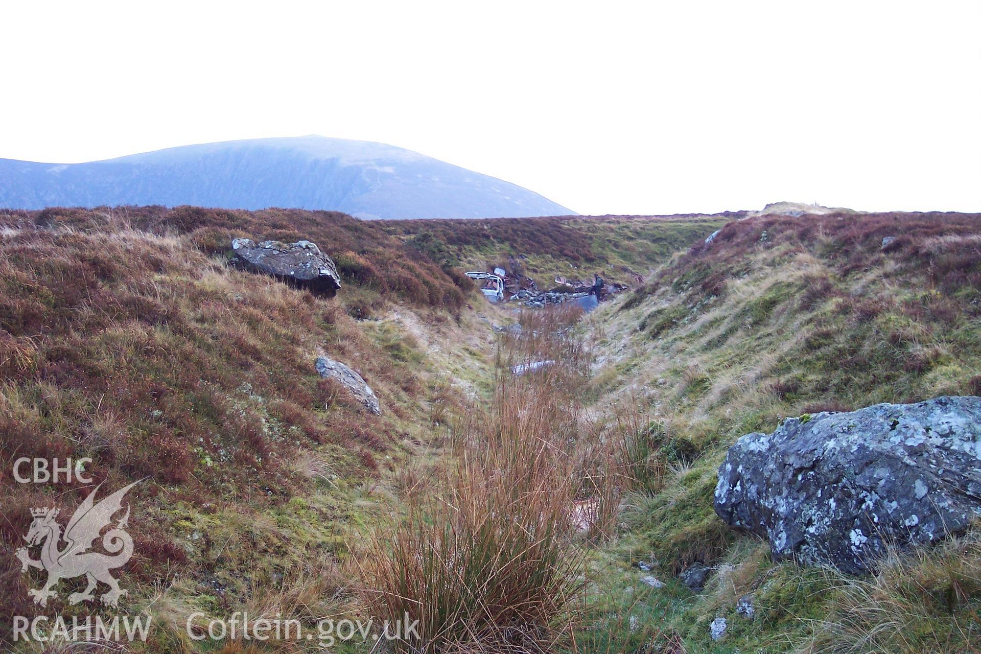 Photograph of Trial Mine II north east of Alexandra Quarry taken on 20/12/2005 by P.J. Schofield during an Upland Survey undertaken by Oxford Archaeology North.