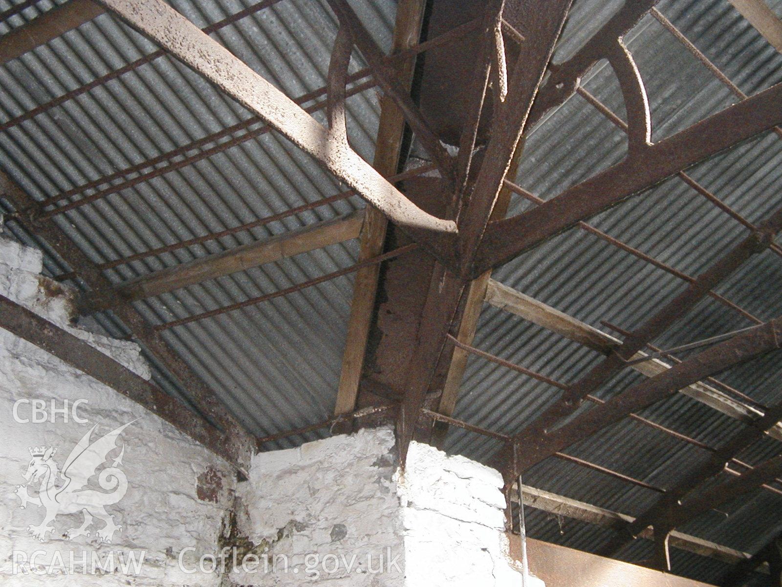 Digital colour photograph showing wall fixings in the centre crown section in the interior of the South range of Newport Cattle market.