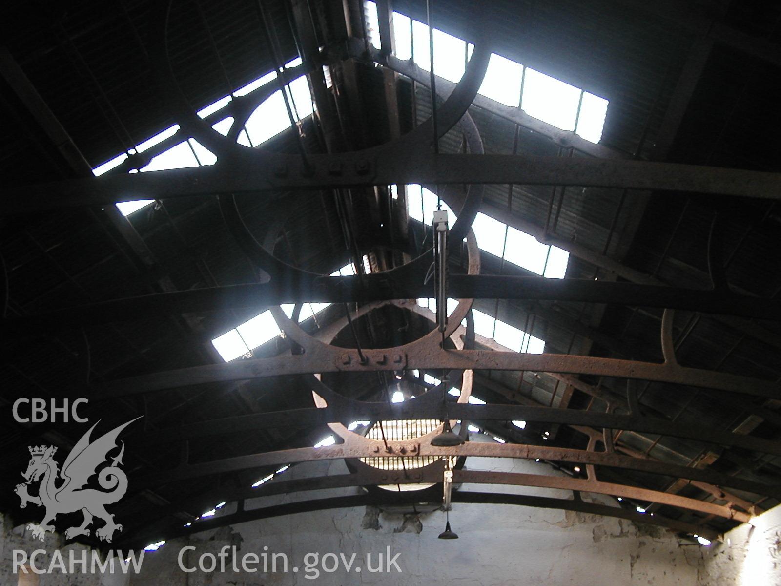 Digital colour photograph showing a general view of roof trusses in the interior of the South range of Newport Cattle Market.