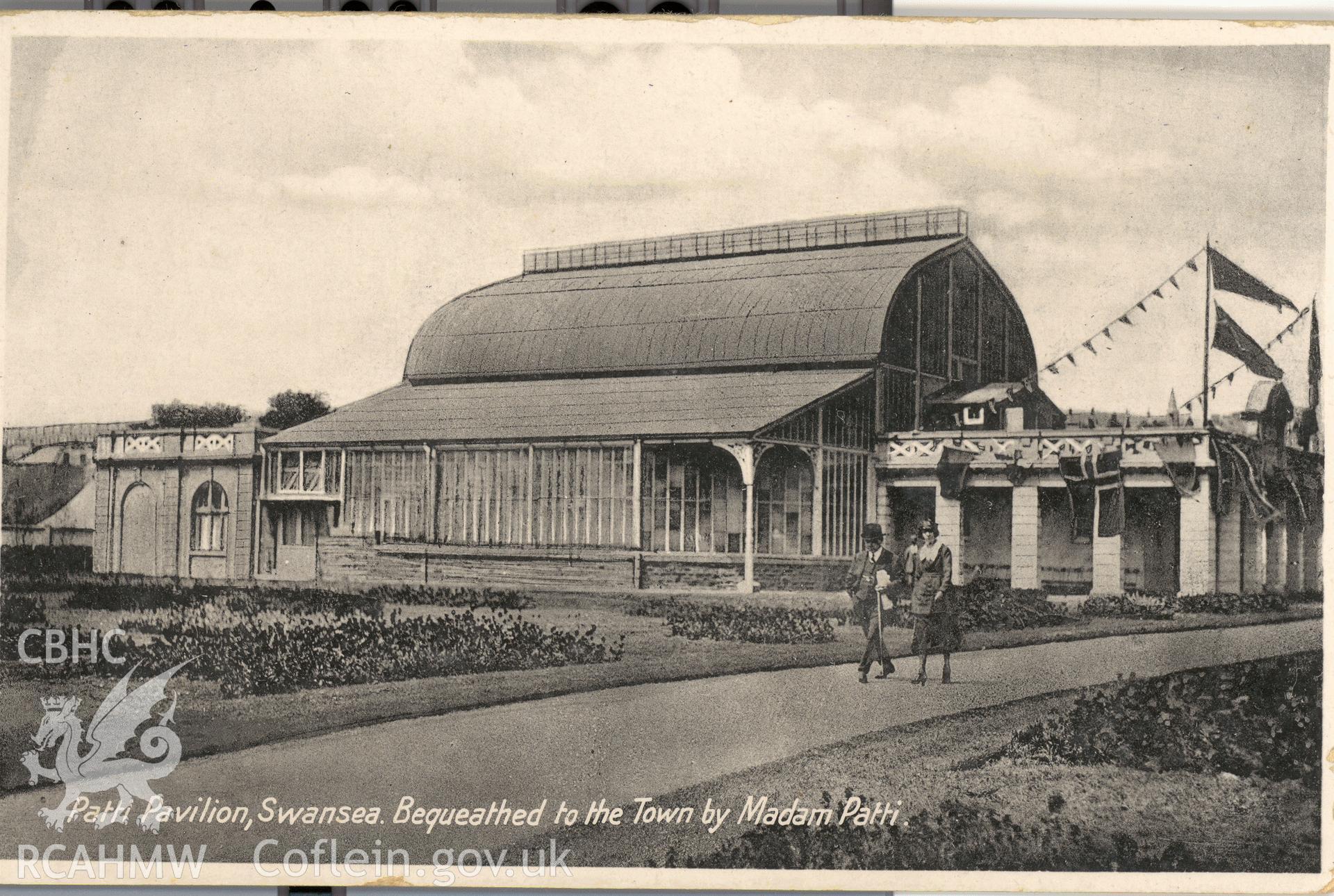 Digitised postcard image of Patti Pavilion, Swansea, with figures. Produced by Parks and Gardens Data Services, from an original item in the Peter Davis Collection at Parks and Gardens UK. We hold only web-resolution images of this collection, suitable for viewing on screen and for research purposes only. We do not hold the original images, or publication quality scans.