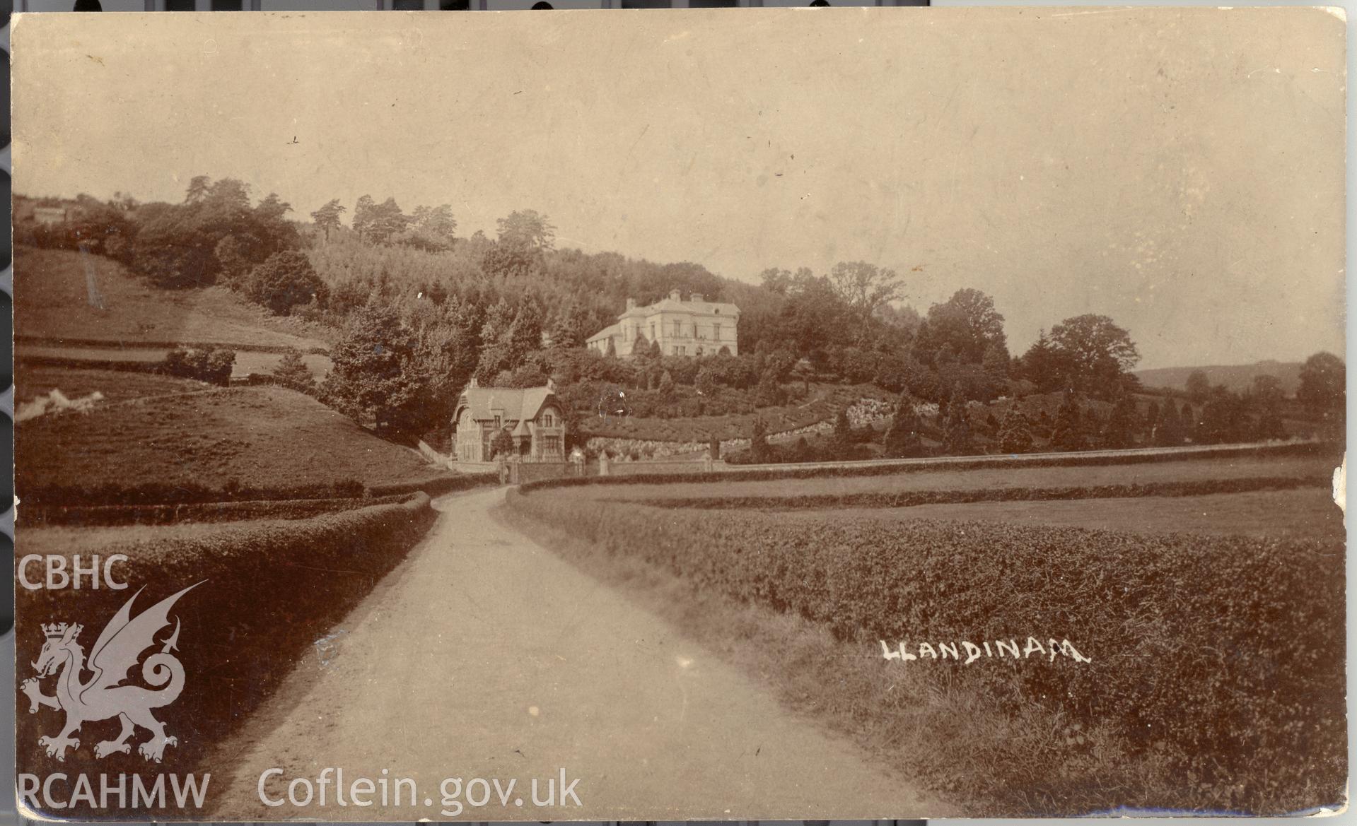 Digitised postcard image of Broneirion, Llandinam, with lodge. Produced by Parks and Gardens Data Services, from an original item in the Peter Davis Collection at Parks and Gardens UK. We hold only web-resolution images of this collection, suitable for viewing on screen and for research purposes only. We do not hold the original images, or publication quality scans.