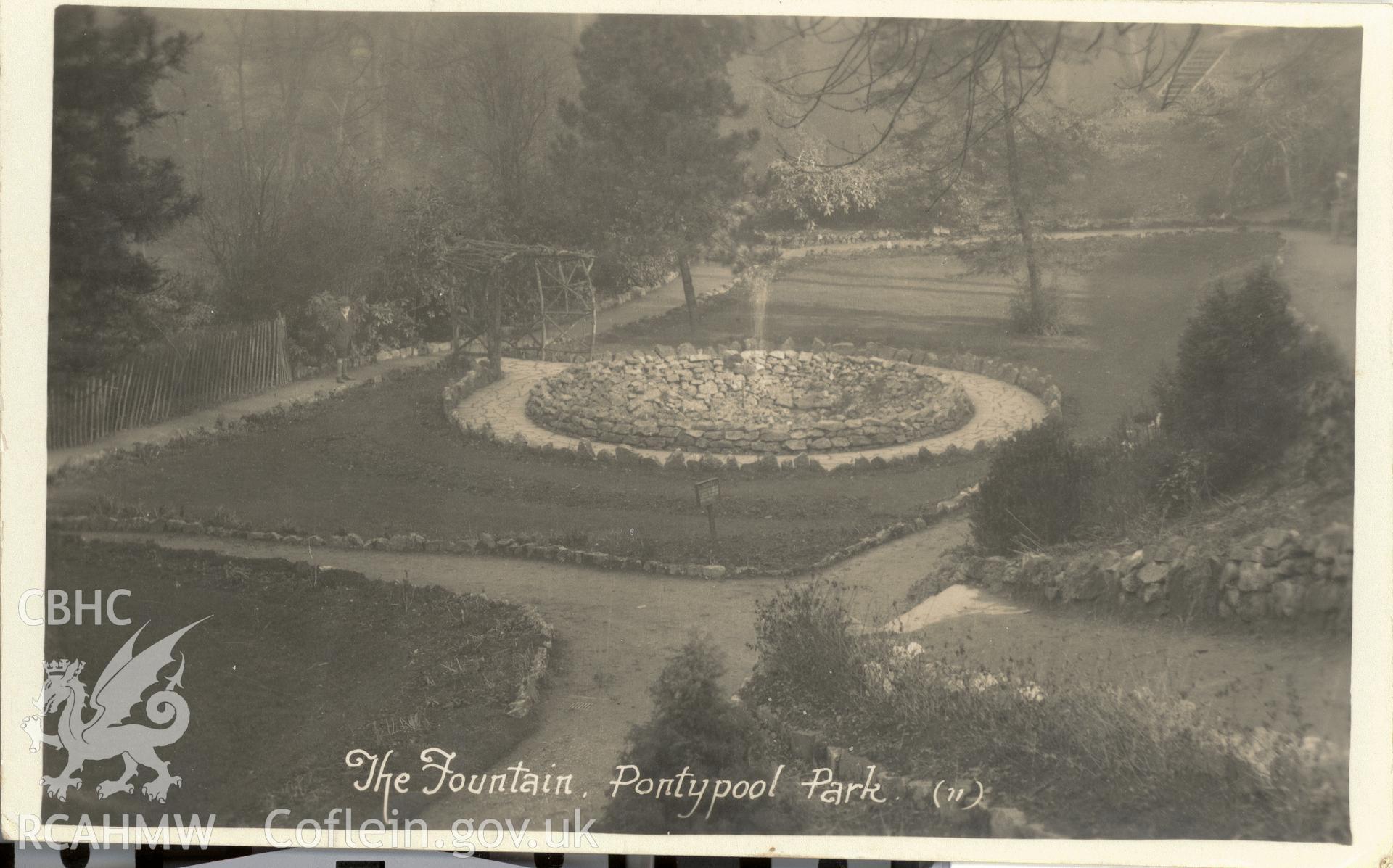 Digitised postcard image of the fountain, Pontypool park. Produced by Parks and Gardens Data Services, from an original item in the Peter Davis Collection at Parks and Gardens UK. We hold only web-resolution images of this collection, suitable for viewing on screen and for research purposes only. We do not hold the original images, or publication quality scans.