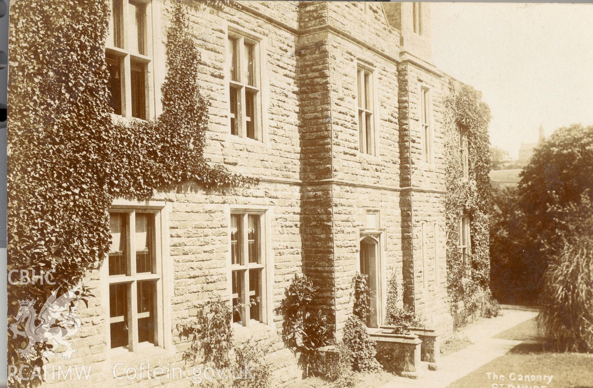 Digitised postcard image of the canonry, St David's. Produced by Parks and Gardens Data Services, from an original item in the Peter Davis Collection at Parks and Gardens UK. We hold only web-resolution images of this collection, suitable for viewing on screen and for research purposes only. We do not hold the original images, or publication quality scans.