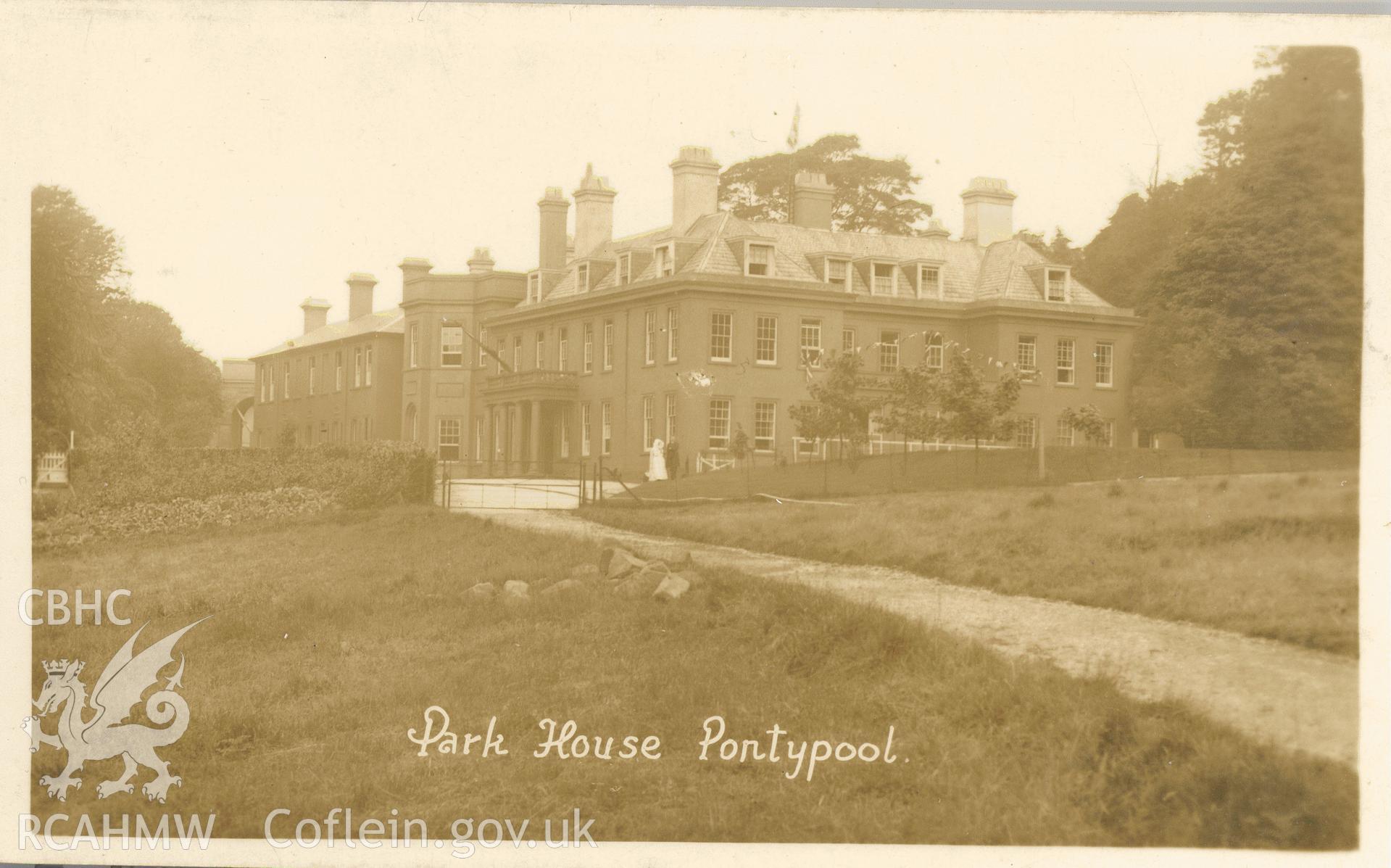 Digitised postcard image of Park House, Pontypool, with wedding couple, Viner and Co. Produced by Parks and Gardens Data Services, from an original item in the Peter Davis Collection at Parks and Gardens UK. We hold only web-resolution images of this collection, suitable for viewing on screen and for research purposes only. We do not hold the original images, or publication quality scans.