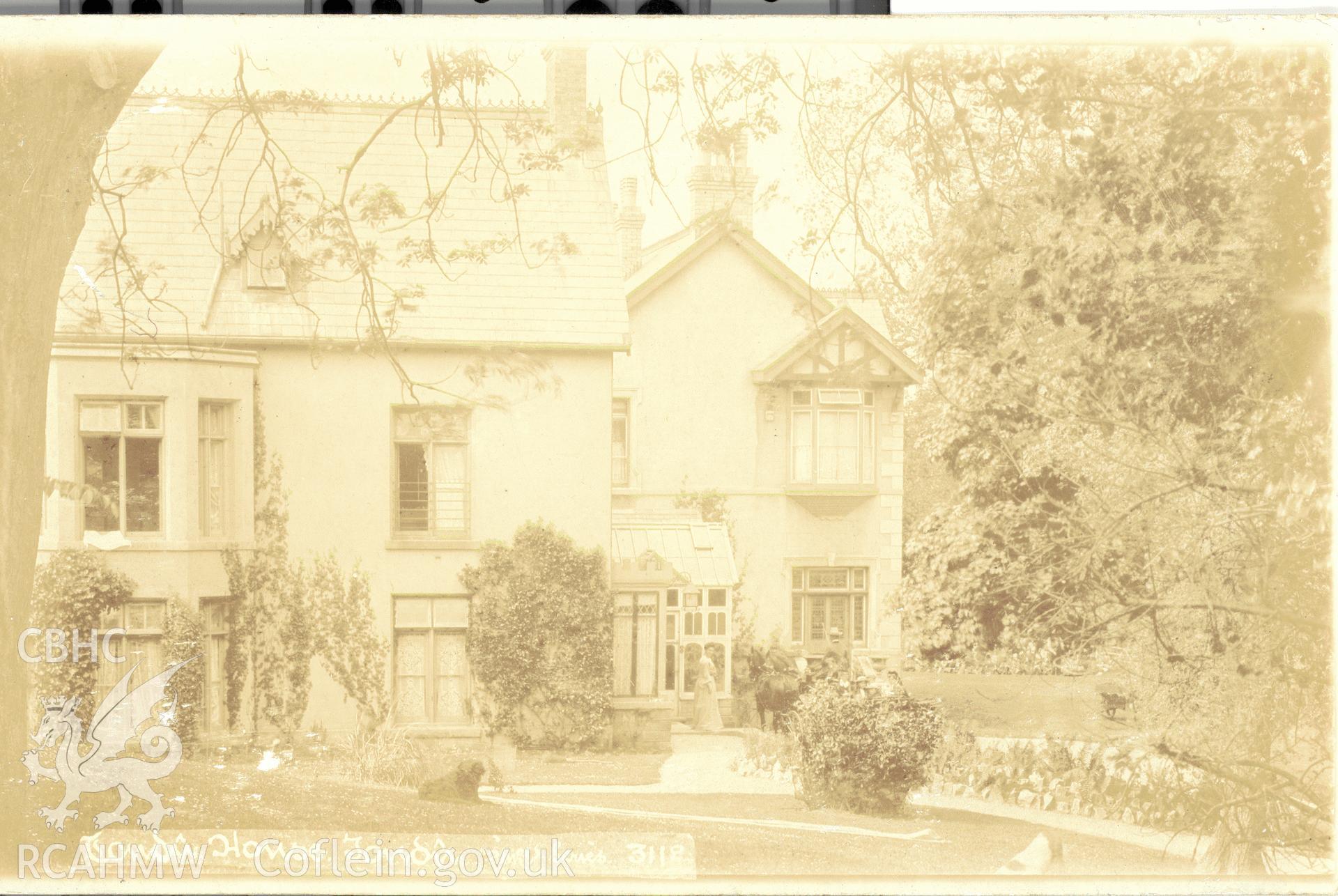 Digitised postcard image of Tondu House, Tondu, with figures, E. Miles, Photographer, Bridgend. Produced by Parks and Gardens Data Services, from an original item in the Peter Davis Collection at Parks and Gardens UK. We hold only web-resolution images of this collection, suitable for viewing on screen and for research purposes only. We do not hold the original images, or publication quality scans.