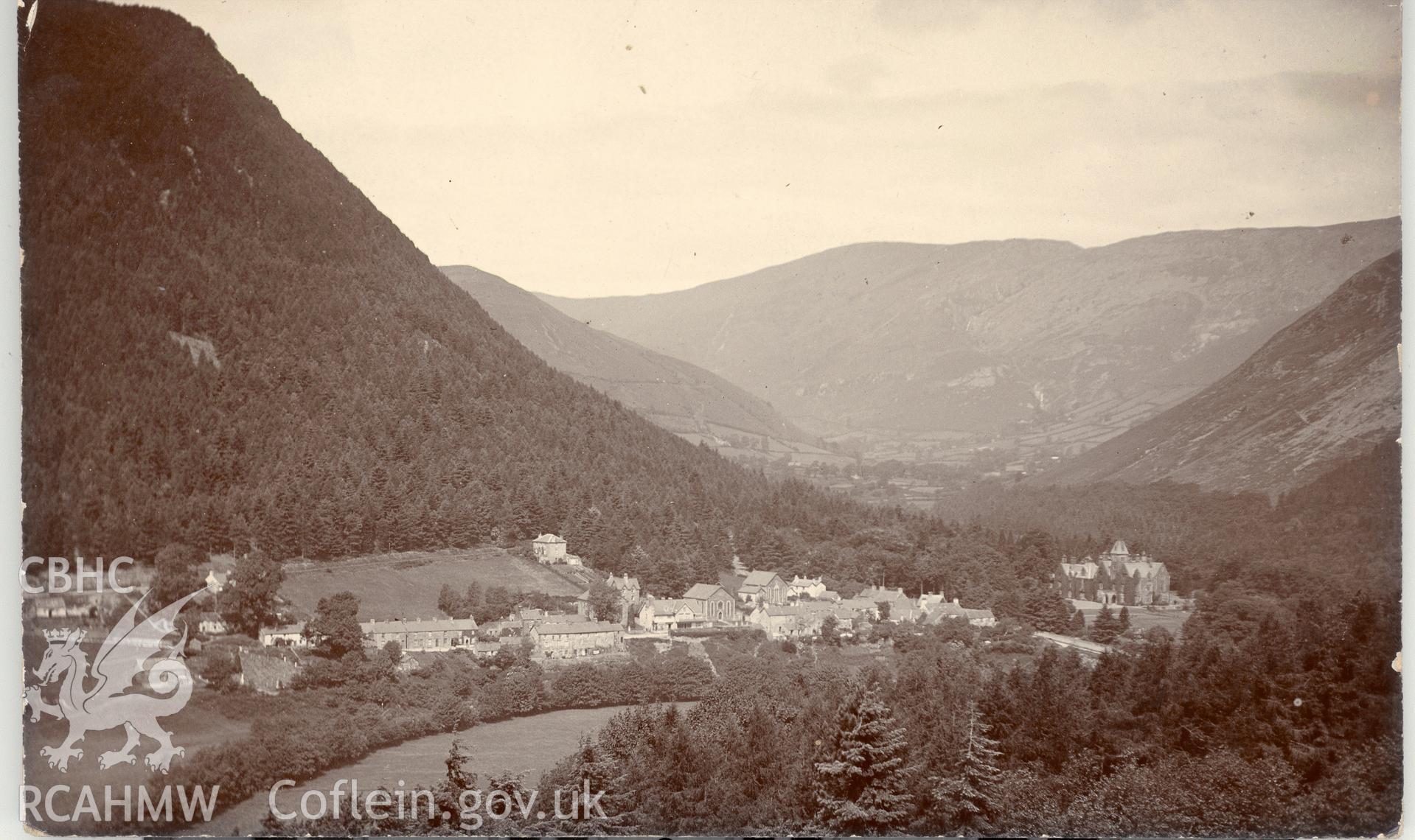 Digitised postcard image of Dinas Mawddwy village. Produced by Parks and Gardens Data Services, from an original item in the Peter Davis Collection at Parks and Gardens UK. We hold only web-resolution images of this collection, suitable for viewing on screen and for research purposes only. We do not hold the original images, or publication quality scans.