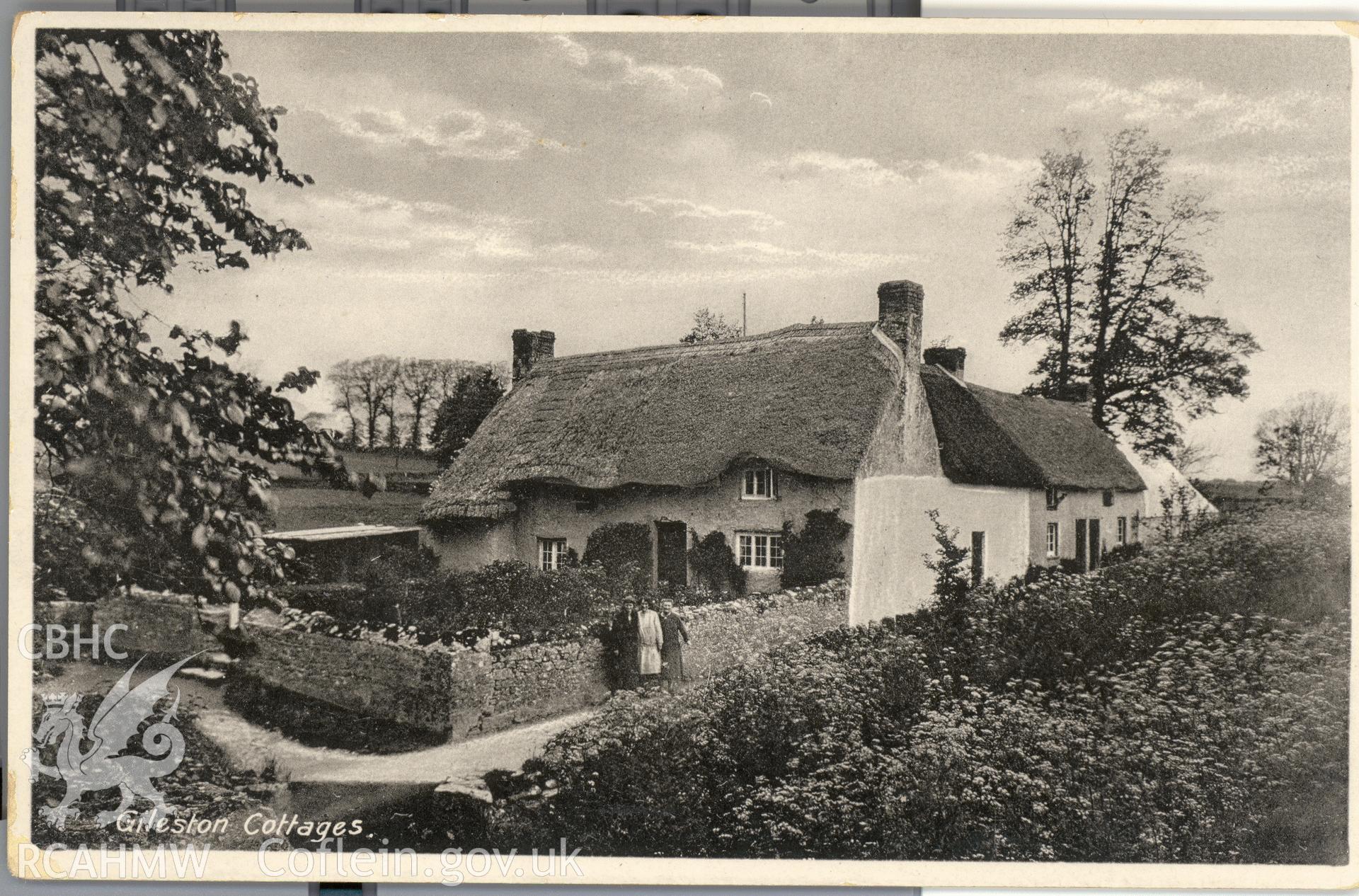 Digitised postcard image of Gileston Cottage, with figures. Produced by Parks and Gardens Data Services, from an original item in the Peter Davis Collection at Parks and Gardens UK. We hold only web-resolution images of this collection, suitable for viewing on screen and for research purposes only. We do not hold the original images, or publication quality scans.