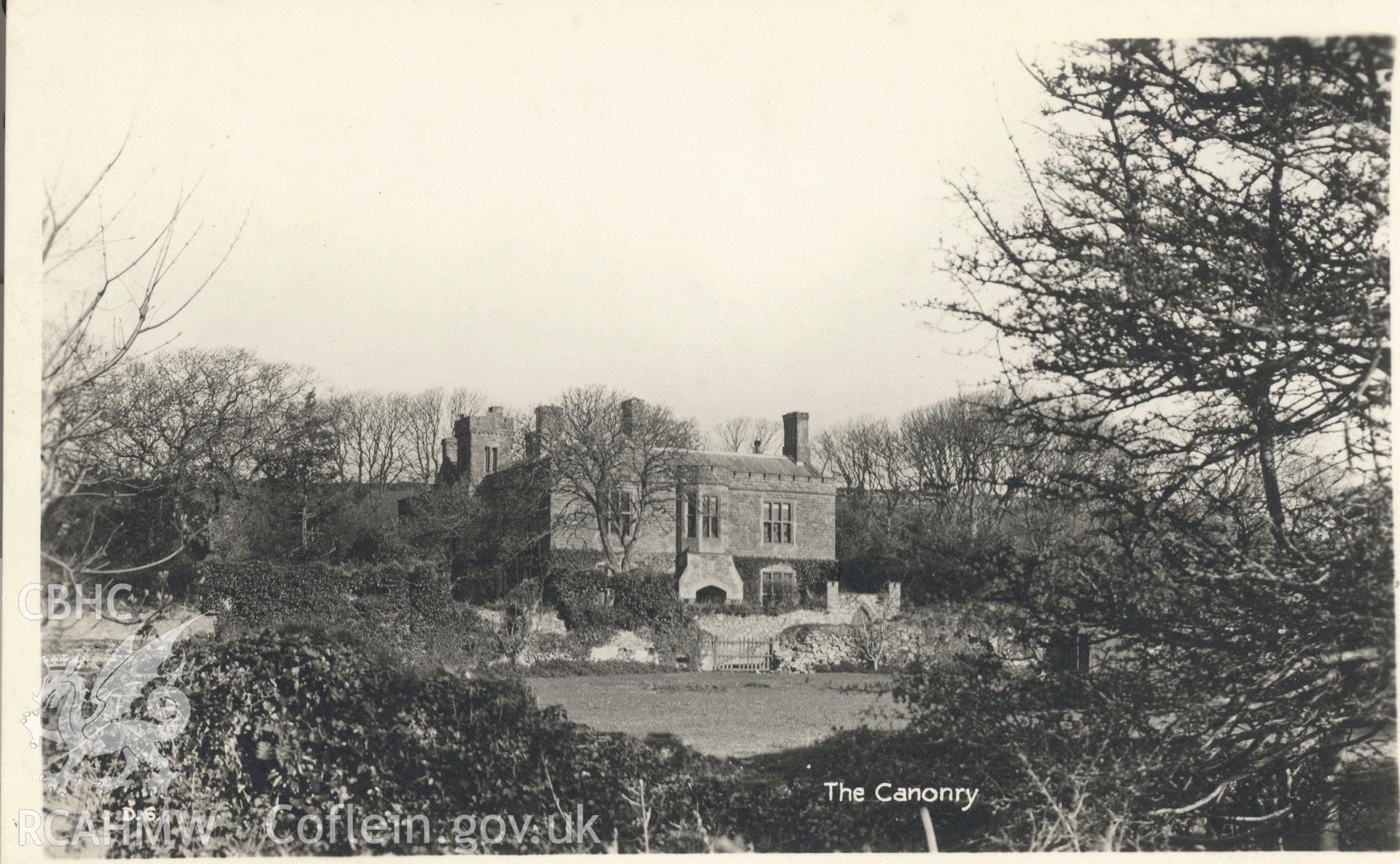 Digitised postcard image of The canonry, St David's, W.M. Mendus, Chemists, St David's. Produced by Parks and Gardens Data Services, from an original item in the Peter Davis Collection at Parks and Gardens UK. We hold only web-resolution images of this collection, suitable for viewing on screen and for research purposes only. We do not hold the original images, or publication quality scans.