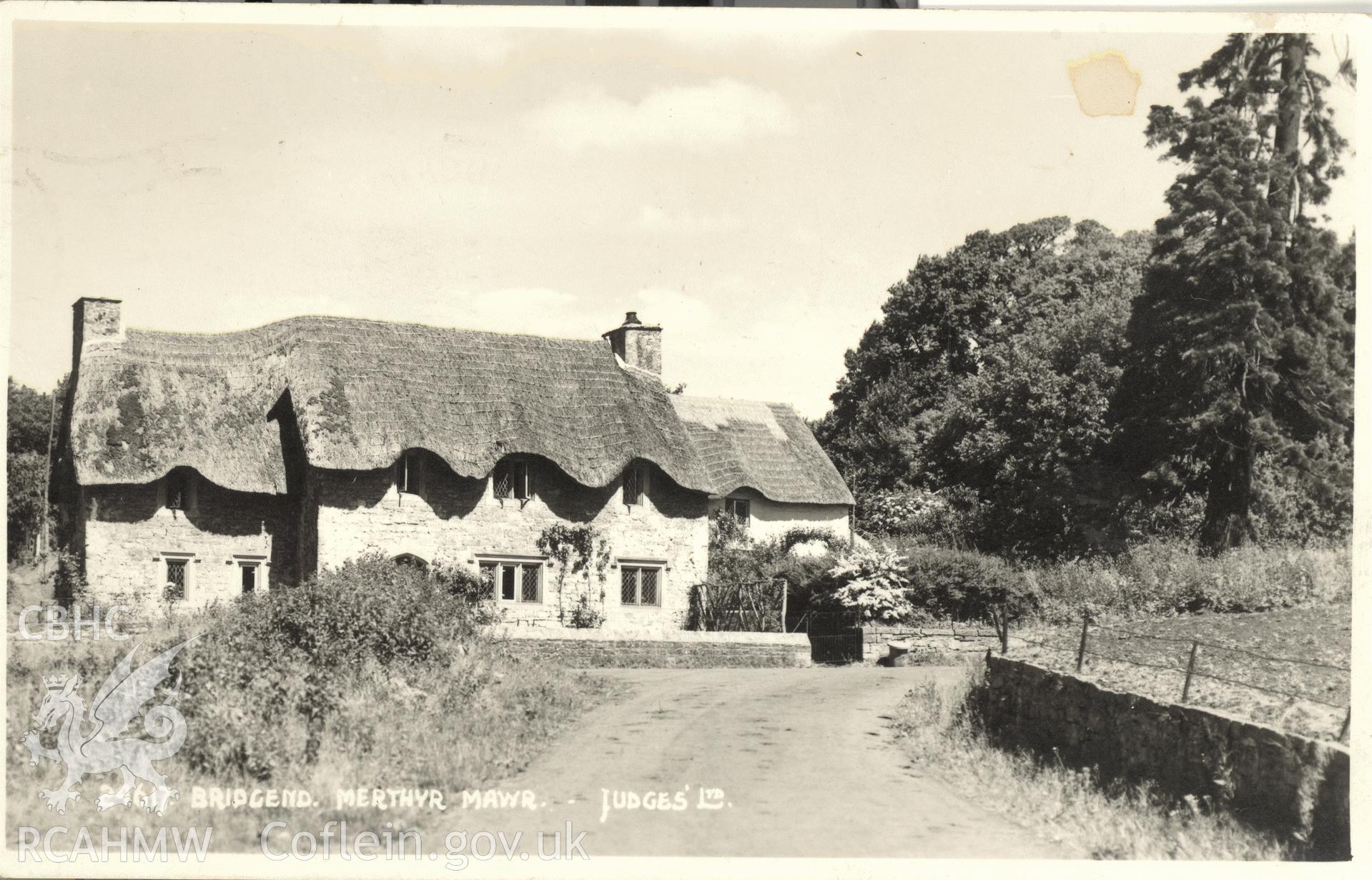 Digitised postcard image of Church Cottage, Merthyr Mawr, Judges Ltd. Produced by Parks and Gardens Data Services, from an original item in the Peter Davis Collection at Parks and Gardens UK. We hold only web-resolution images of this collection, suitable for viewing on screen and for research purposes only. We do not hold the original images, or publication quality scans.