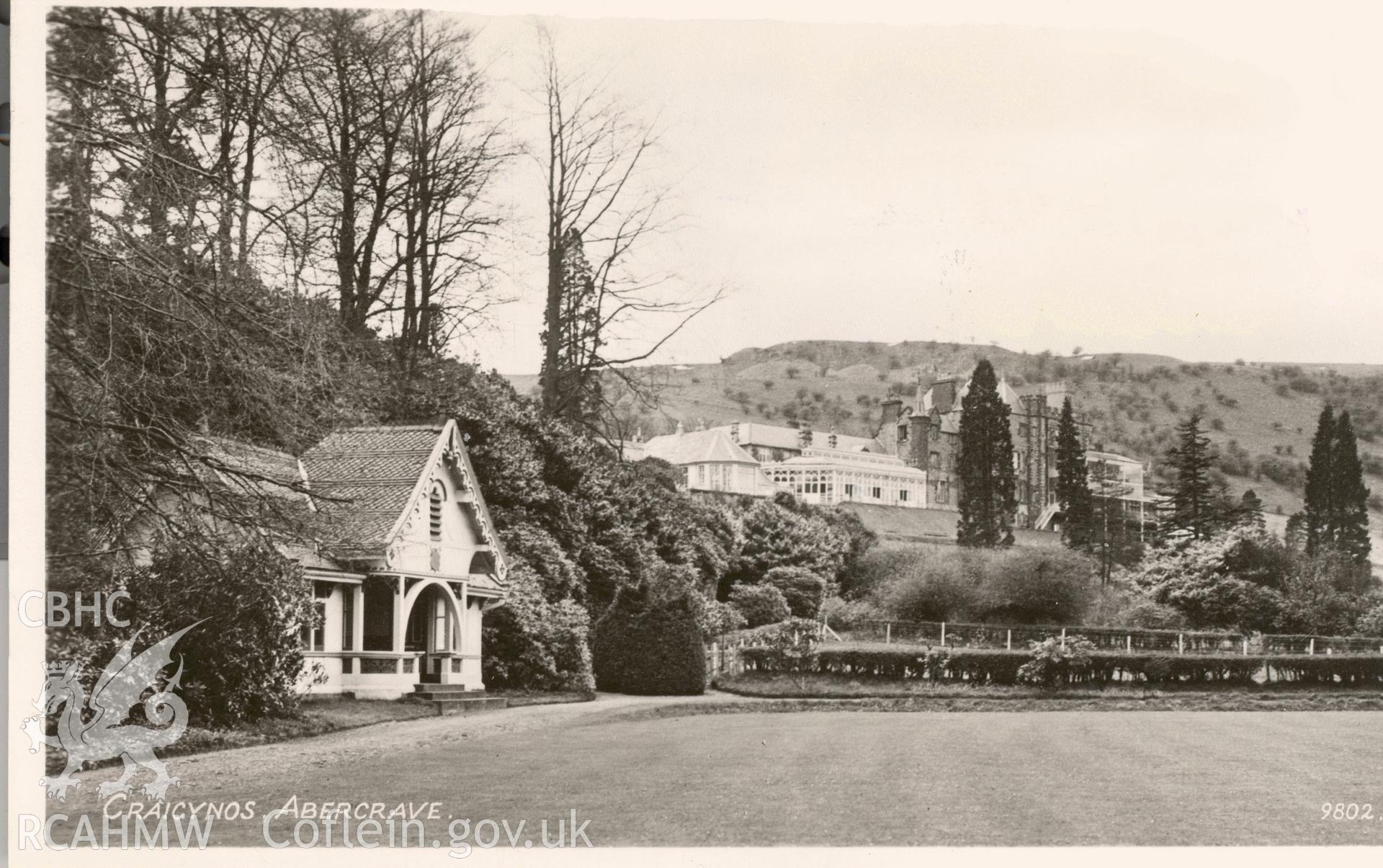 Digitised postcard image of Craig y Nos Castle, Glyntawe, R.A. Postcards Ltd, London. Produced by Parks and Gardens Data Services, from an original item in the Peter Davis Collection at Parks and Gardens UK. We hold only web-resolution images of this collection, suitable for viewing on screen and for research purposes only. We do not hold the original images, or publication quality scans.