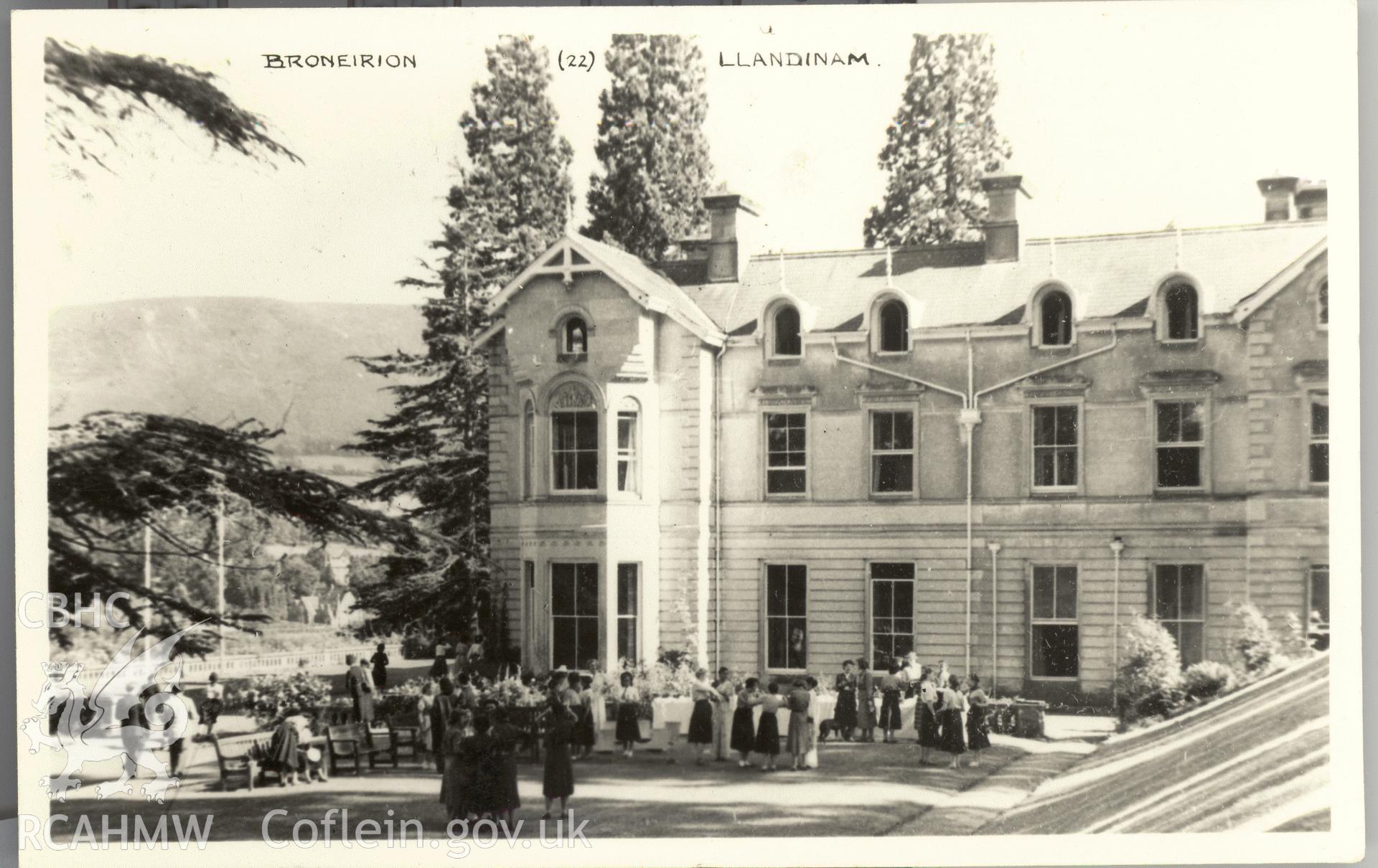 Digitised postcard image of Broneirion, Llandinam, with figures at a garden party (girl guides), Pickfords, Photographers, Aberystwyth. Produced by Parks and Gardens Data Services, from an original item in the Peter Davis Collection at Parks and Gardens UK. We hold only web-resolution images of this collection, suitable for viewing on screen and for research purposes only. We do not hold the original images, or publication quality scans.