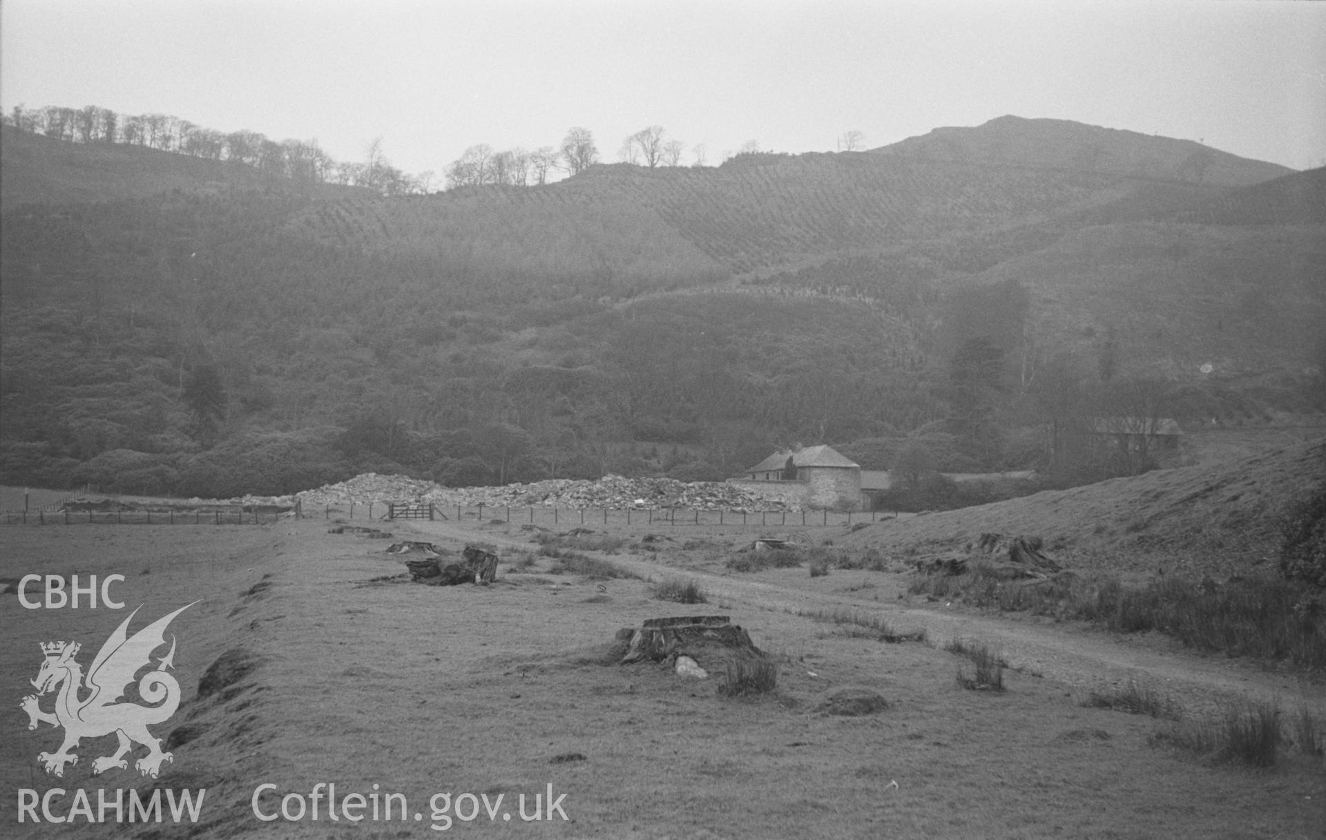 Black and White photograph showing the site of Hafod Uchtryd from the drive. Photographed by Arthur Chater in March 1961 from Grid Reference SN 760 731, looking north west.