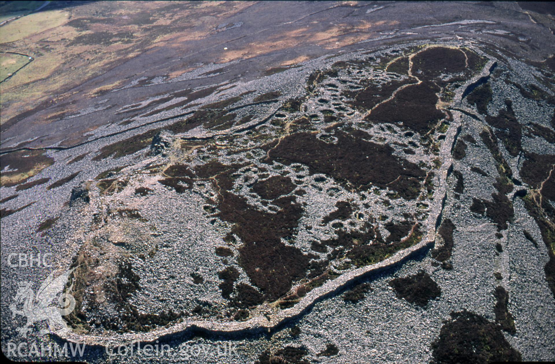 RCAHMW colour slide oblique aerial photograph of cairn I at Gyrn Ddu, Llanaelhaearn;Cynnog, taken by C.R.Musson on the 29/03/1996