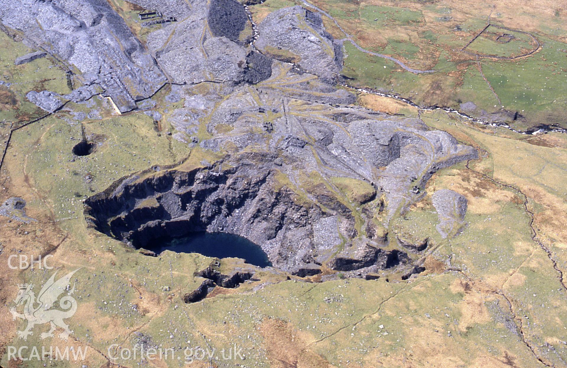 RCAHMW colour slide oblique aerial photograph of Glanafon Quarry, Capel Garmon, Betws Garmon, taken by C.R. Musson, 02/05/94