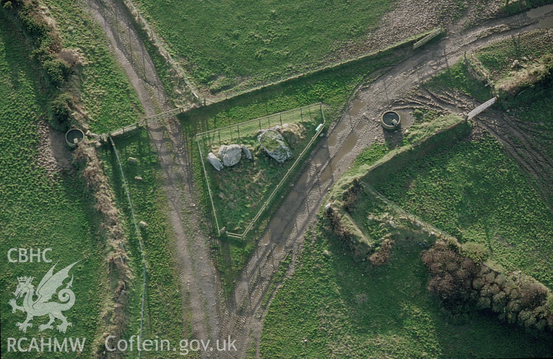 RCAHMW colour slide oblique aerial photograph of St Elvis Farm, Burial Chambers, Solva, taken by C.R. Musson, 16/01/94