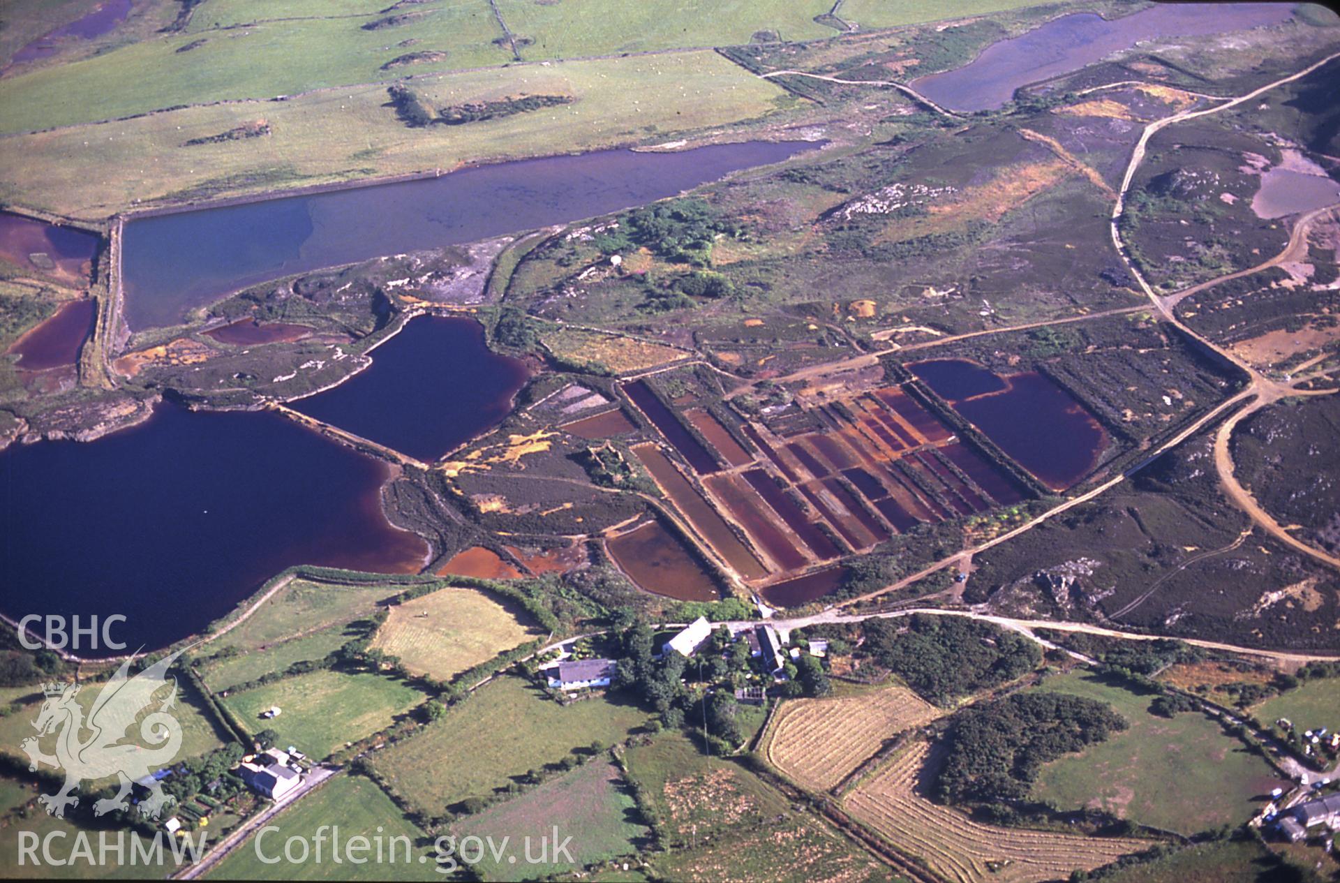 Slide of RCAHMW colour oblique aerial photograph of Parys Mountain Copper Mines, Amlwch, taken by C.R. Musson, 11/7/1989.