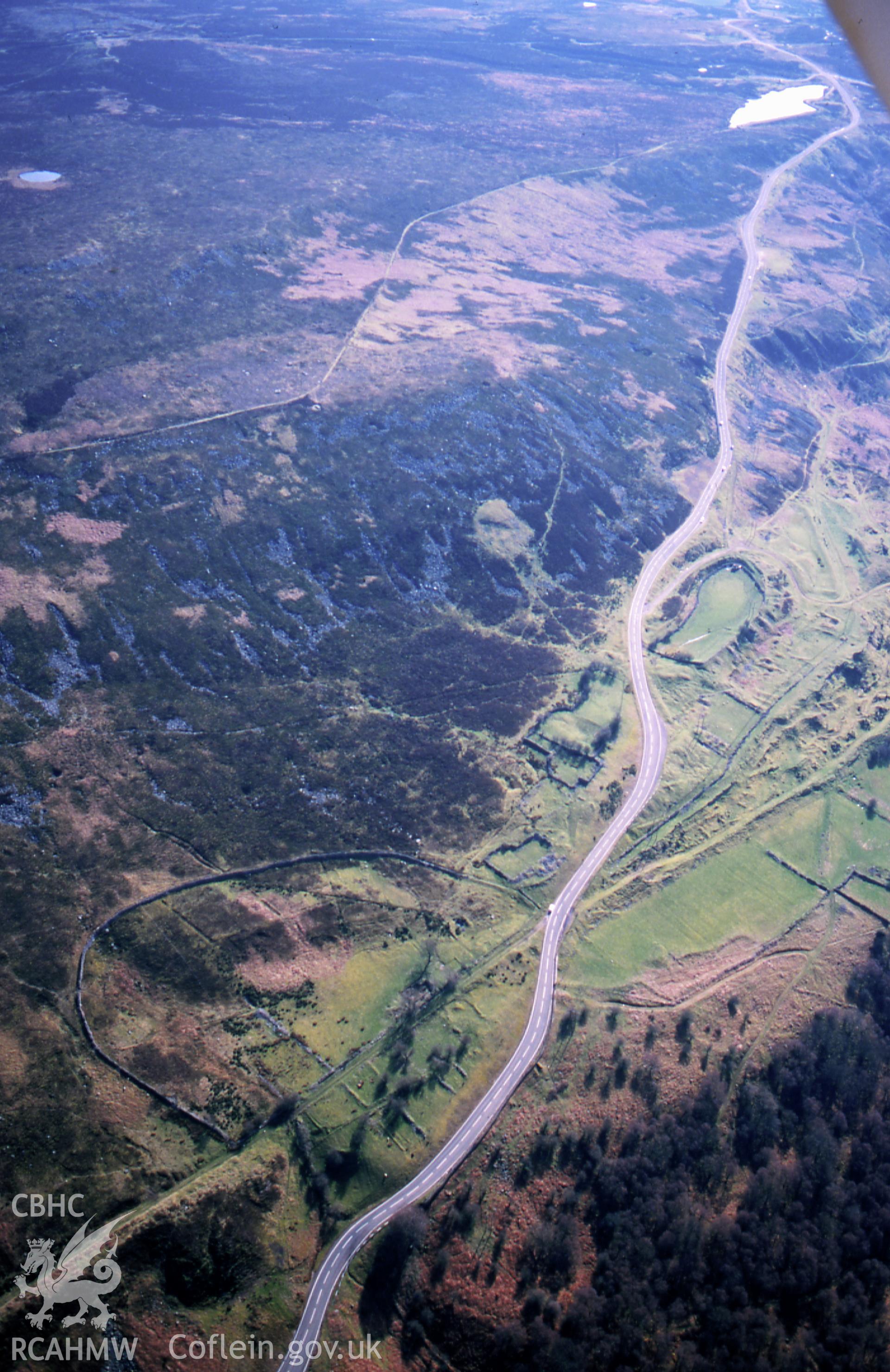 RCAHMW colour slide oblique aerial photograph of Garnddyrus Forge, Llanfoist Fawr, taken on 15/03/1999 by Toby Driver