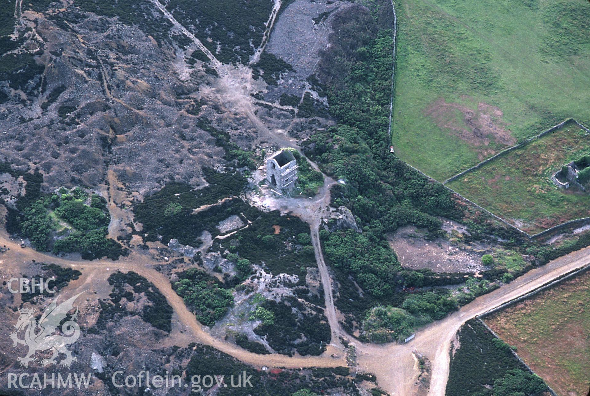 Slide of RCAHMW colour oblique aerial photograph of Parys Mountain: Pearl Shaft Engine House, Mona Mine, Amlwch, taken by C.R. Musson, 27/7/1996.