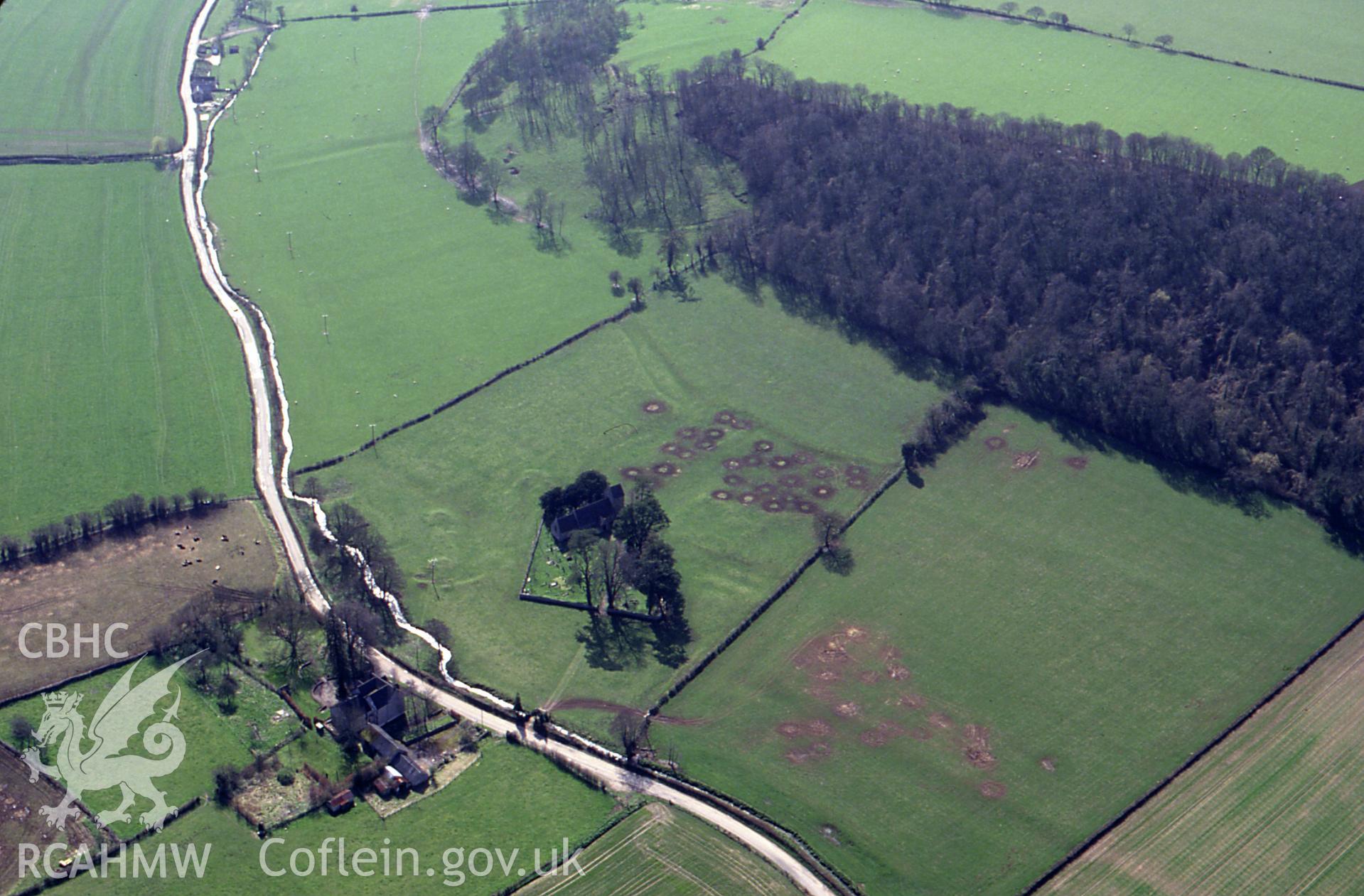 RCAHMW colour slide oblique aerial photograph of St. Brides Settlement, Netherwent,, Caerwent, taken by C.R. Musson, 24/03/94