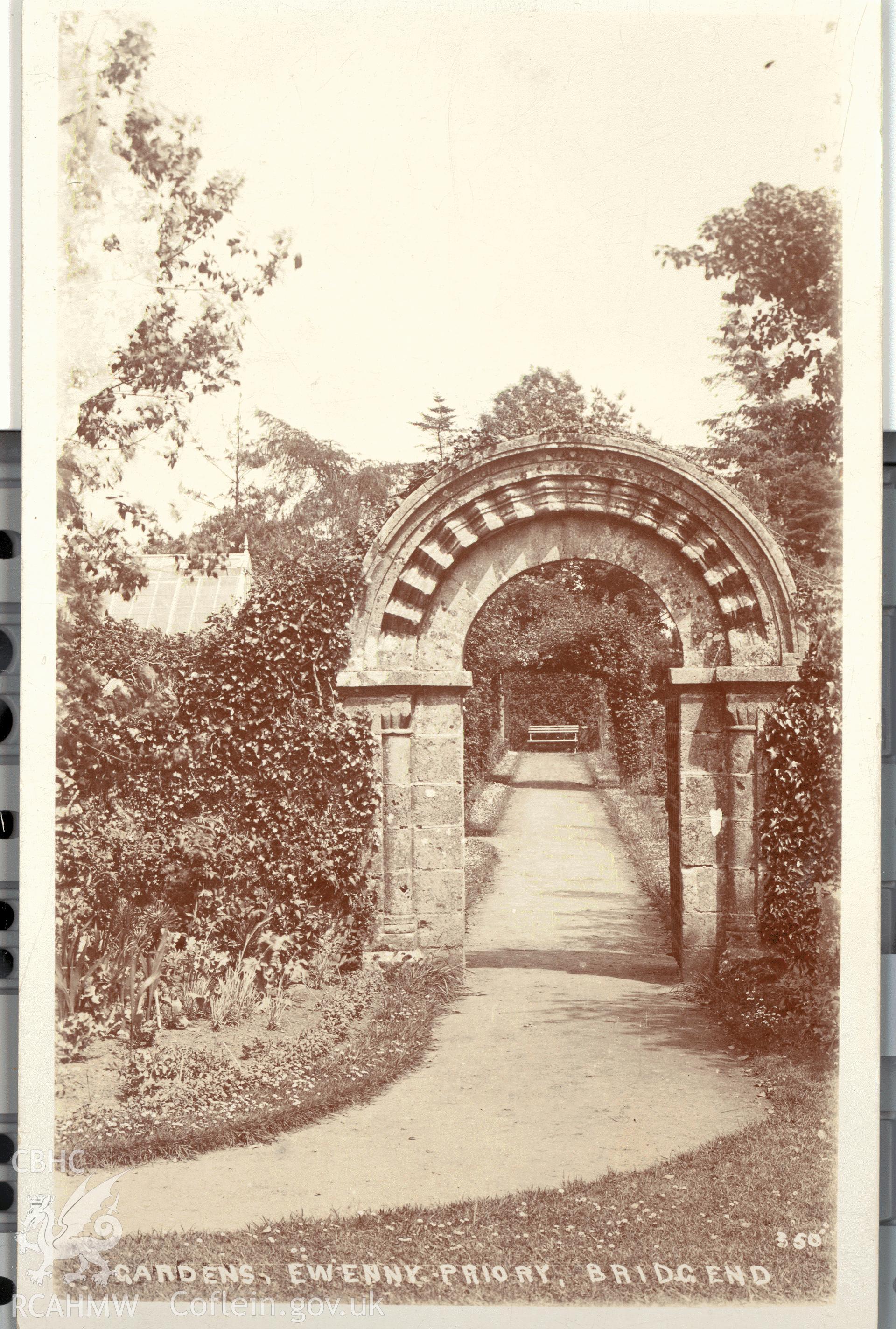 Digitised postcard image of Ewenny Priory, gateway in garden wall, the Miles Series, Ewenny Road Studio, Bridgend. Produced by Parks and Gardens Data Services, from an original item in the Peter Davis Collection at Parks and Gardens UK. We hold only web-resolution images of this collection, suitable for viewing on screen and for research purposes only. We do not hold the original images, or publication quality scans.