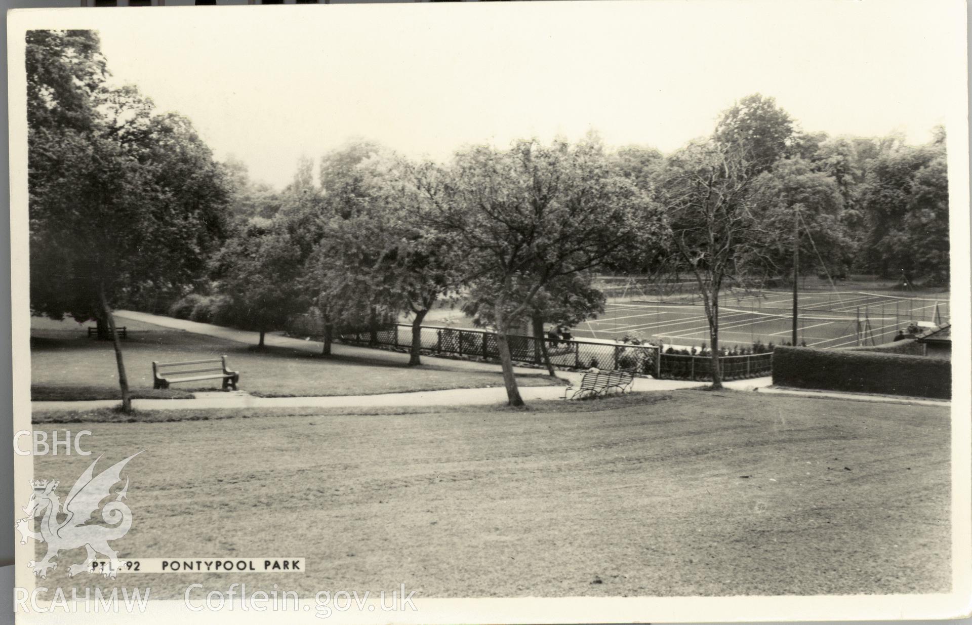 Digitised postcard image of Pontypool Park, tennis courts, Frith's Series. Produced by Parks and Gardens Data Services, from an original item in the Peter Davis Collection at Parks and Gardens UK. We hold only web-resolution images of this collection, suitable for viewing on screen and for research purposes only. We do not hold the original images, or publication quality scans.