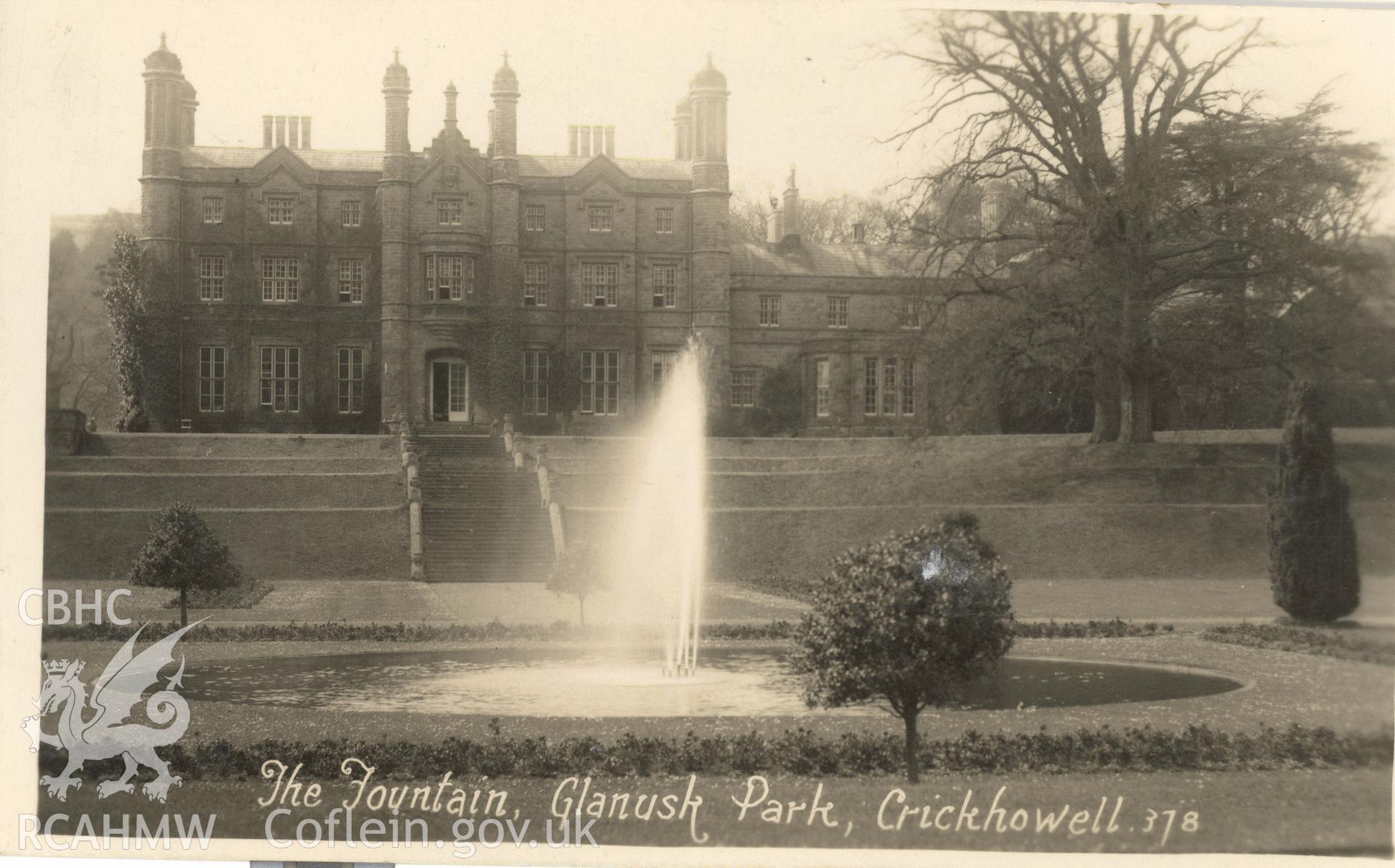 Digitised postcard image of fountain, Glanusk Park House. Produced by Parks and Gardens Data Services, from an original item in the Peter Davis Collection at Parks and Gardens UK. We hold only web-resolution images of this collection, suitable for viewing on screen and for research purposes only. We do not hold the original images, or publication quality scans.