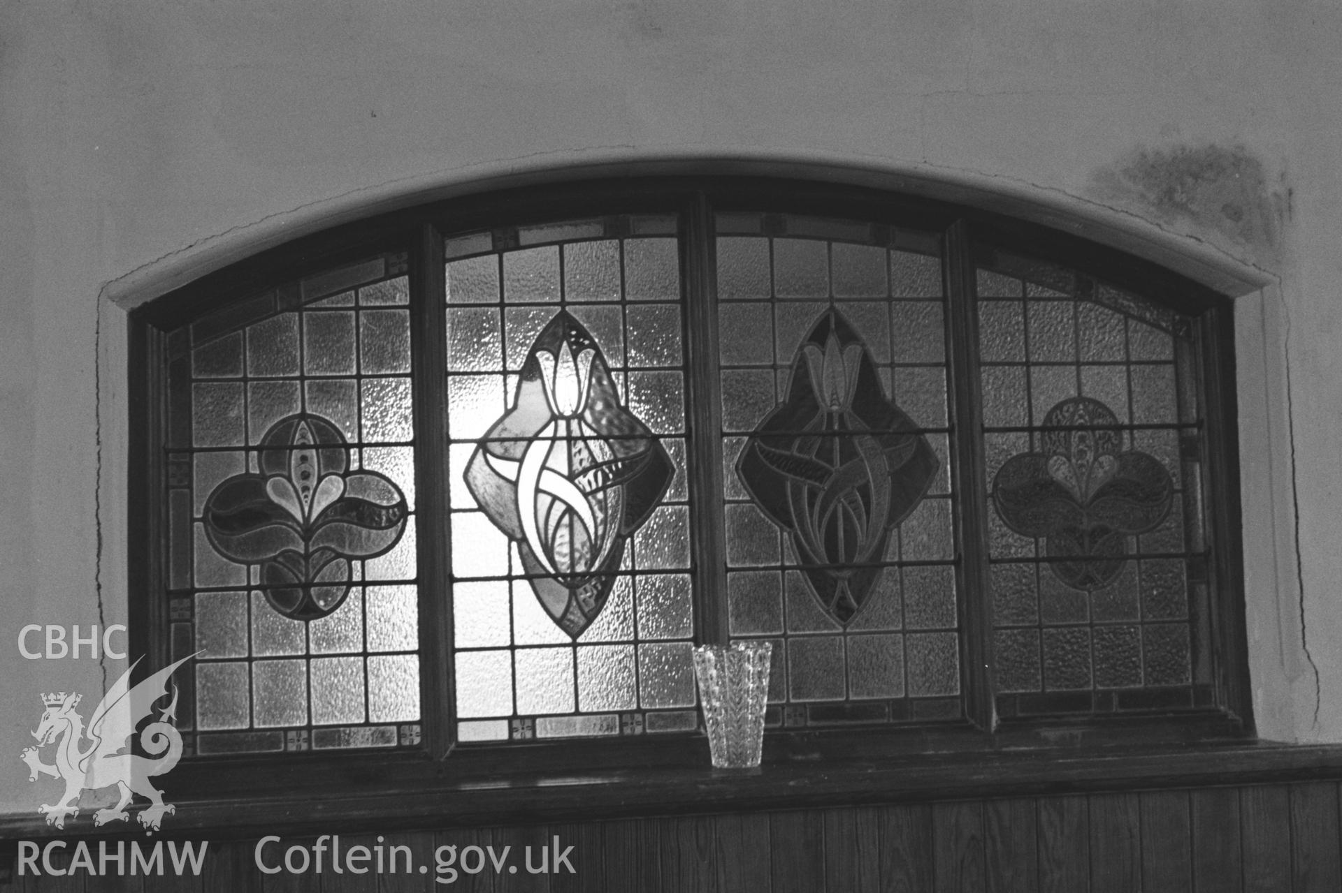 Interior, stained glass window at rear of chapel, through to vestibule. NA/CD/97/025