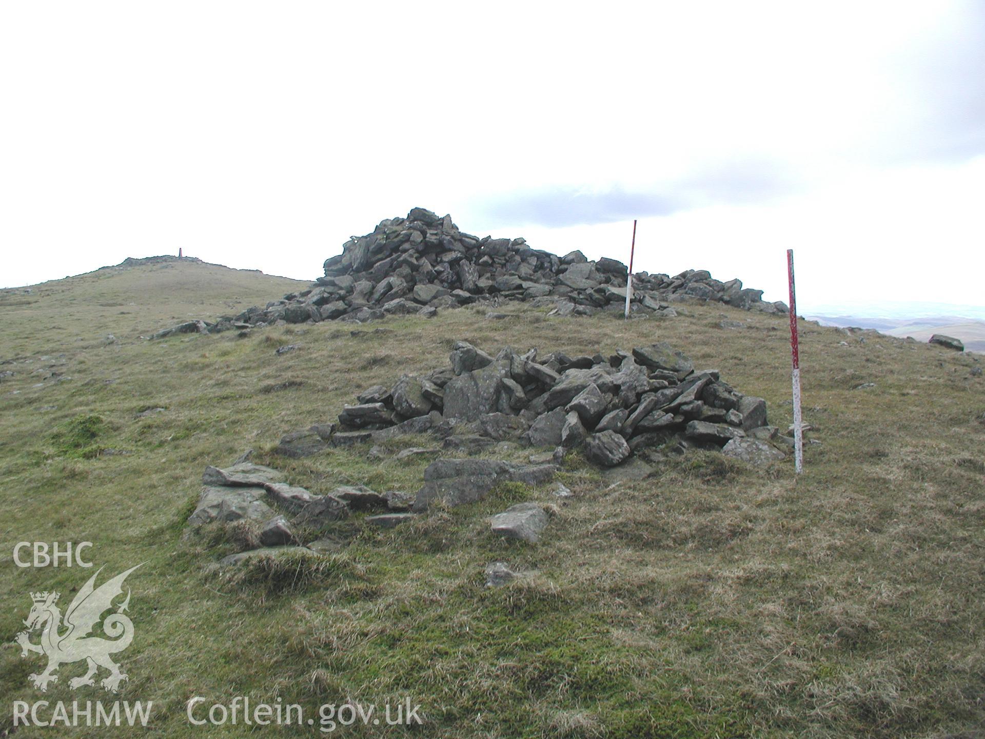 Photograph of the northern cairn on Pen Plynlimon Fawr taken on 18/10/2004 by R.S. Jones during an Upland Survey undertaken by Cambrian Archaeological Projects.