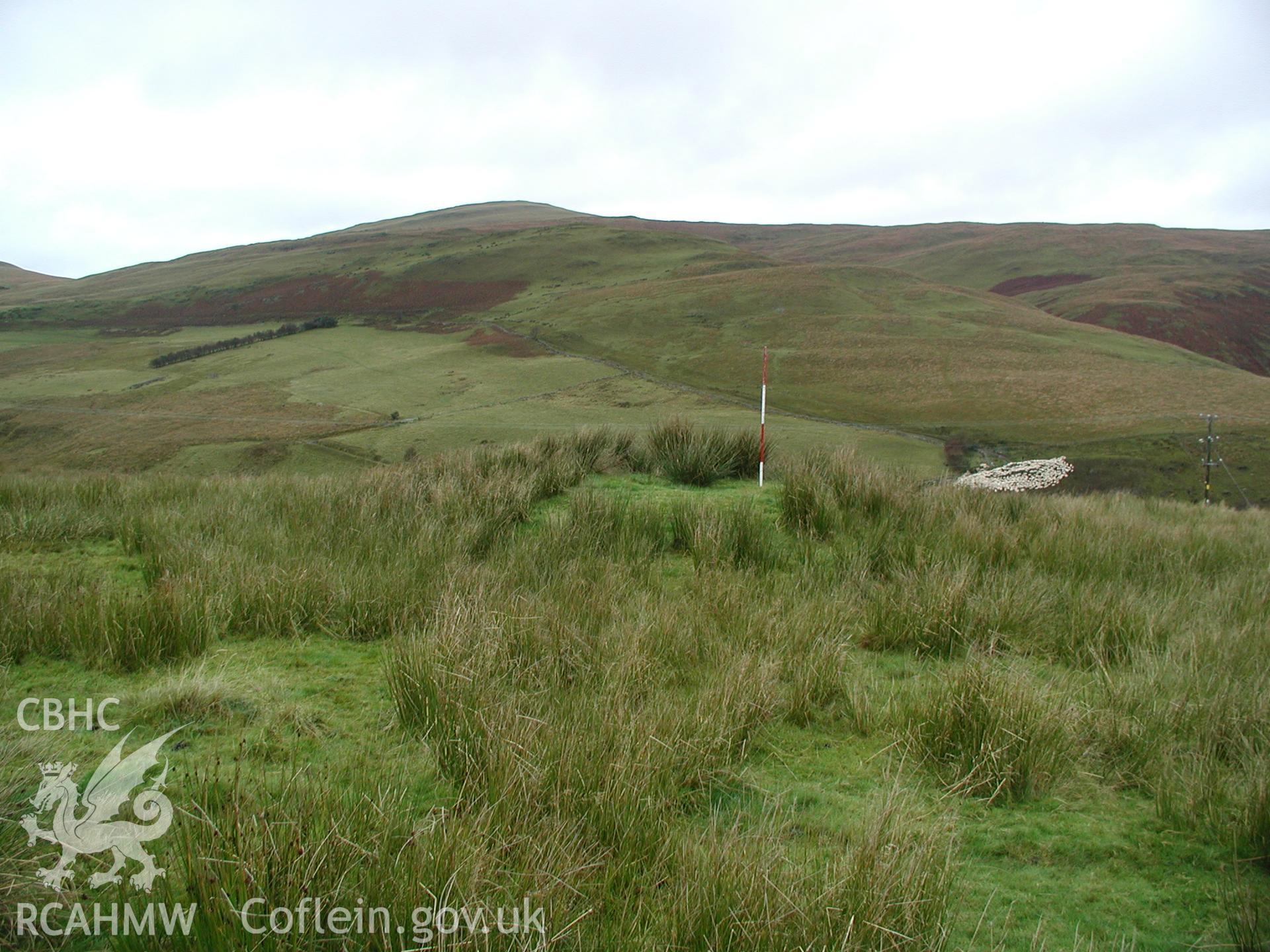 Photograph of Garnedd y Barrow taken on 24/10/2004 by R.S. Jones during an Upland Survey undertaken by Cambrian Archaeological Projects.