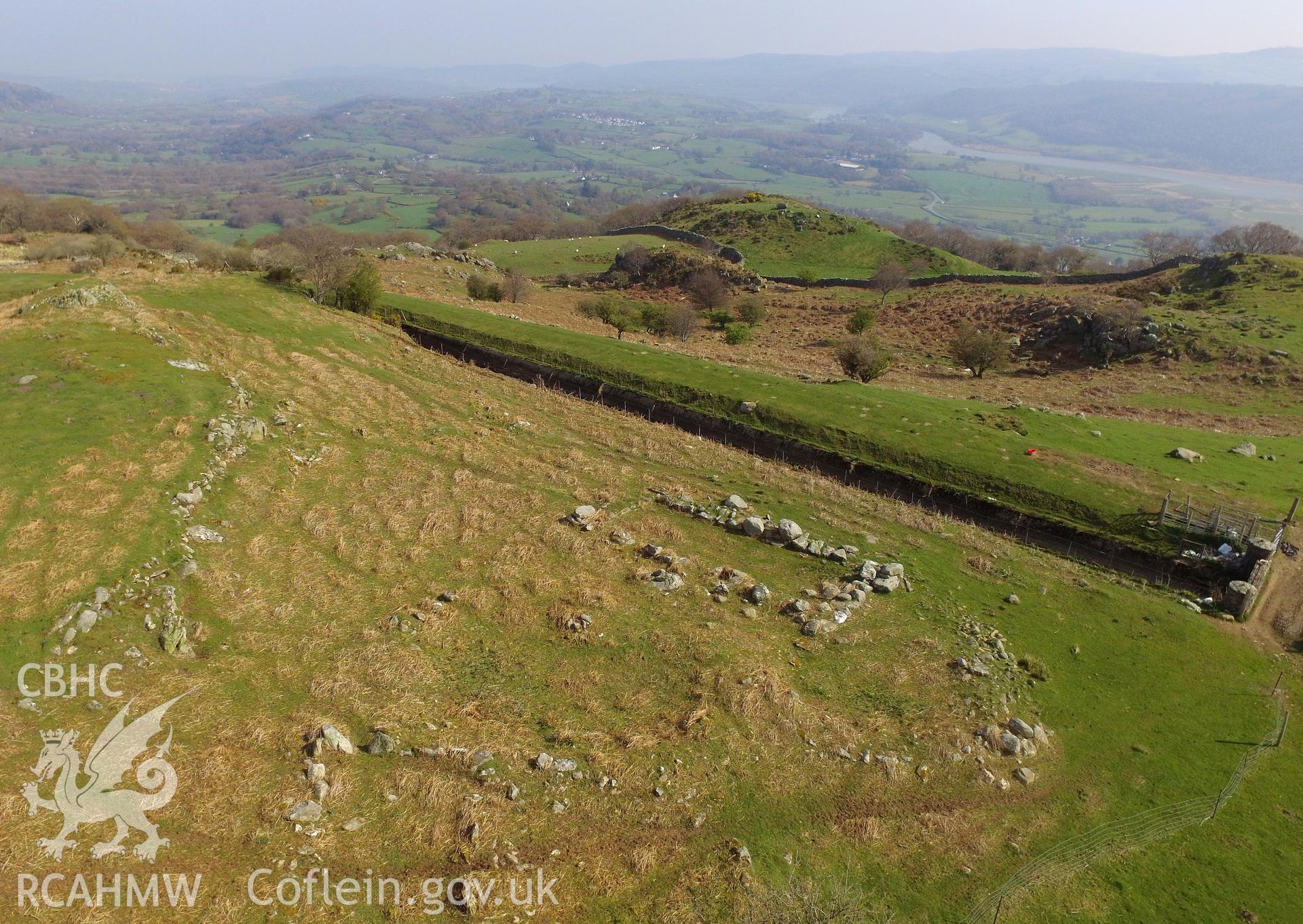 Colour photo showing long hut settlement at Pen y Gaer, produced by Paul R. Davis,  19th April 2017.