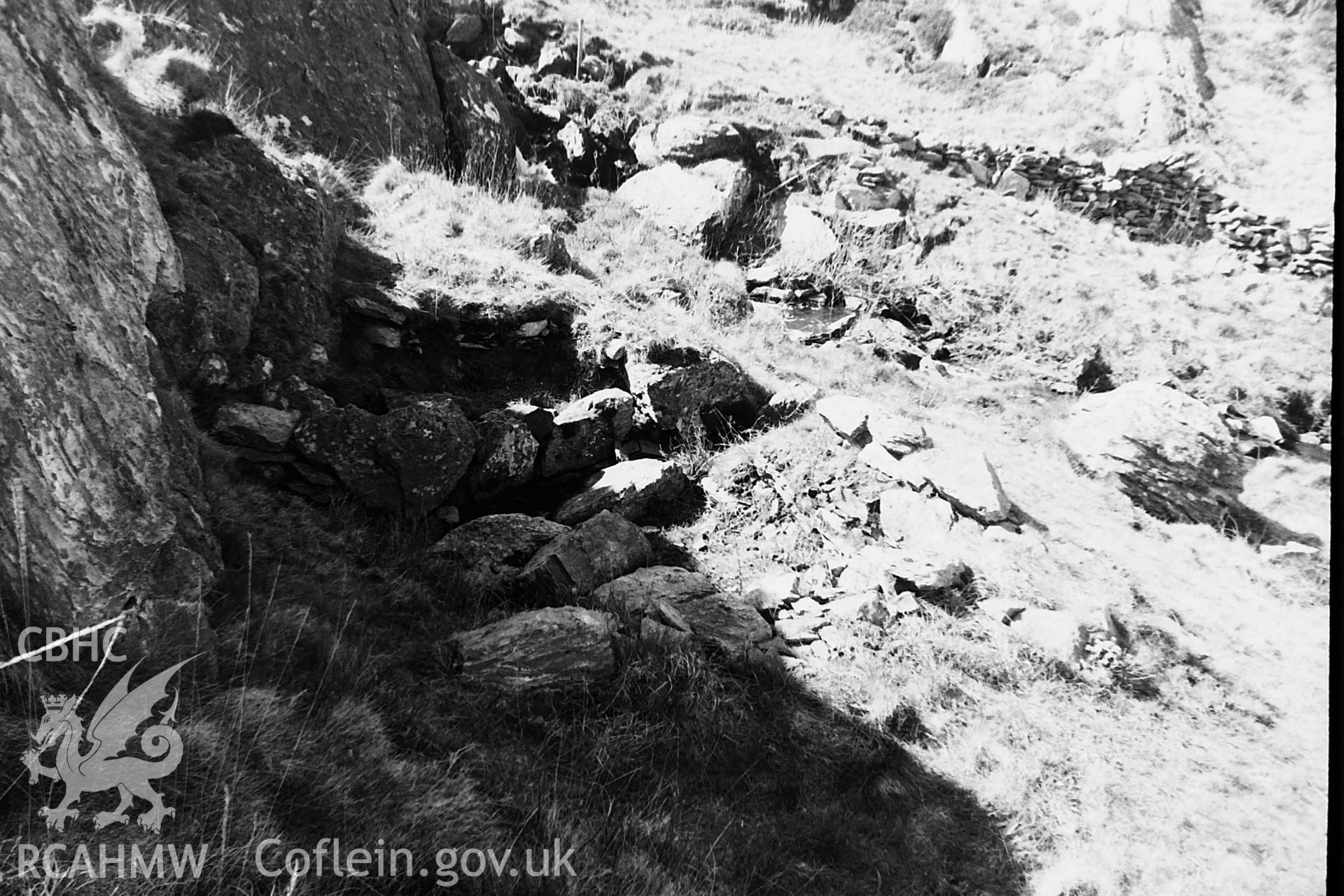 Black and white photo showing Ffynnon Eilian, taken by Paul R. Davis, undated.