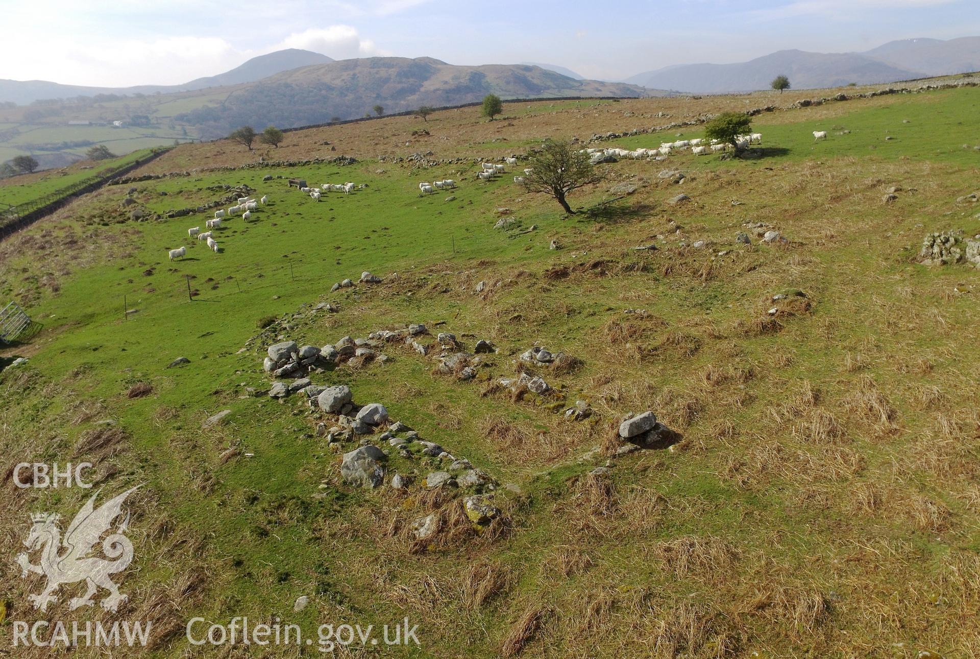 Colour photo showing long hut settlement at Pen y Gaer, produced by Paul R. Davis,  19th April 2017.