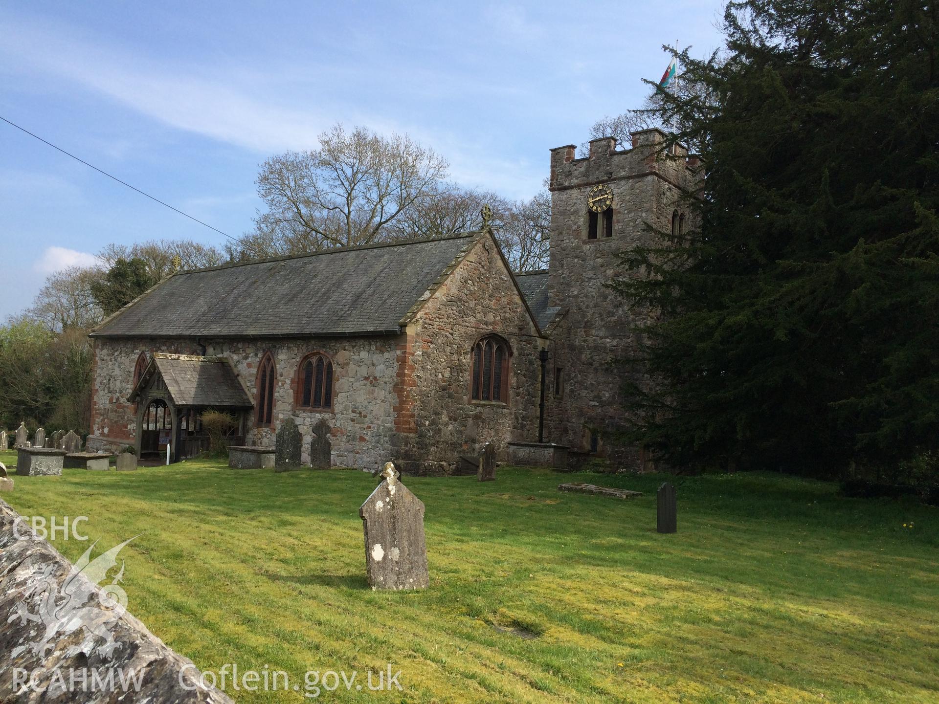 Colour photo showing Llanrhaeadr Church,  produced by Paul R. Davis, 9th April 2017.