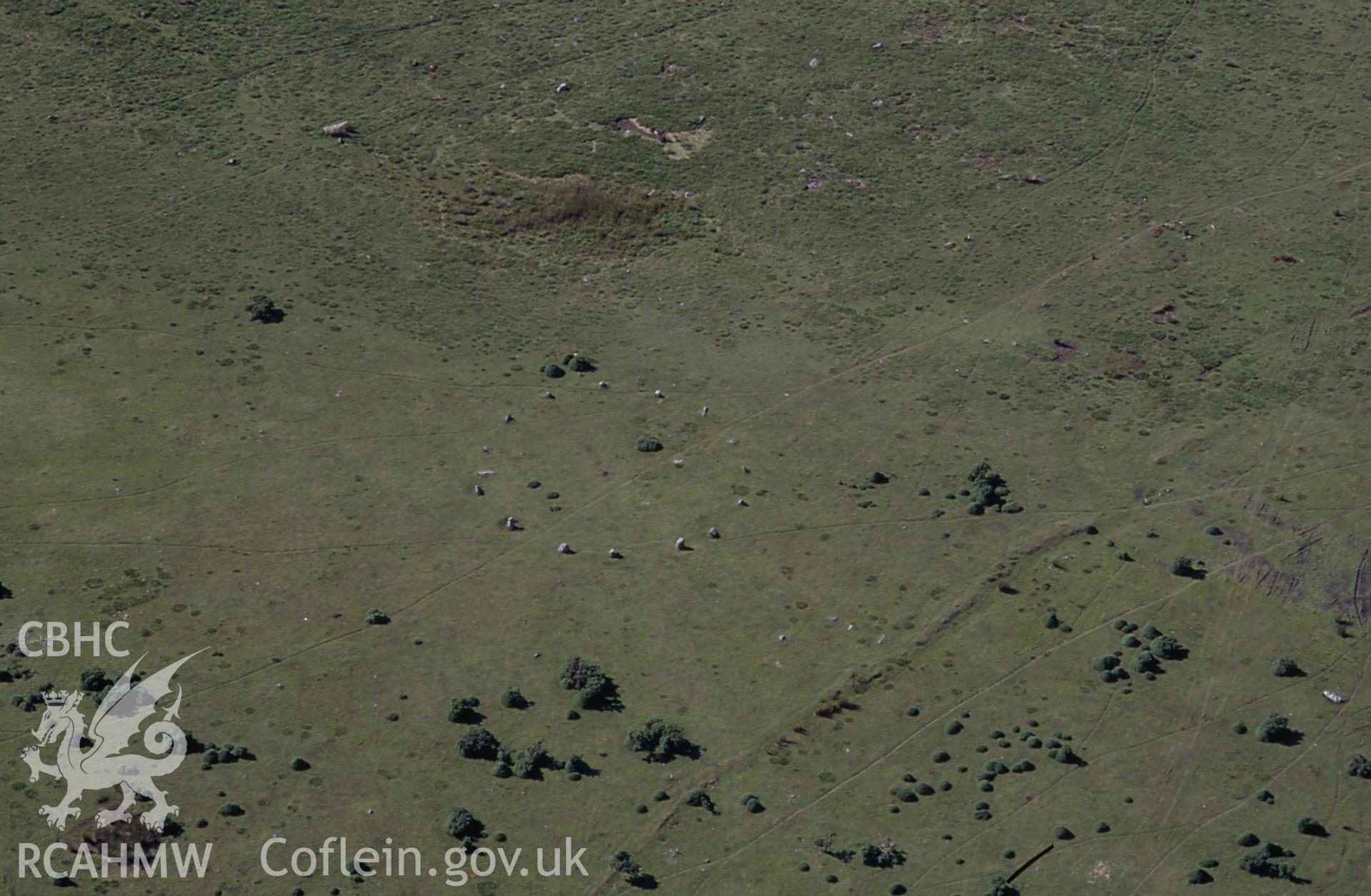 RCAHMW colour oblique aerial photograph of Gors Fawr Stone Circle taken on 24/07/1995 by C.R. Musson