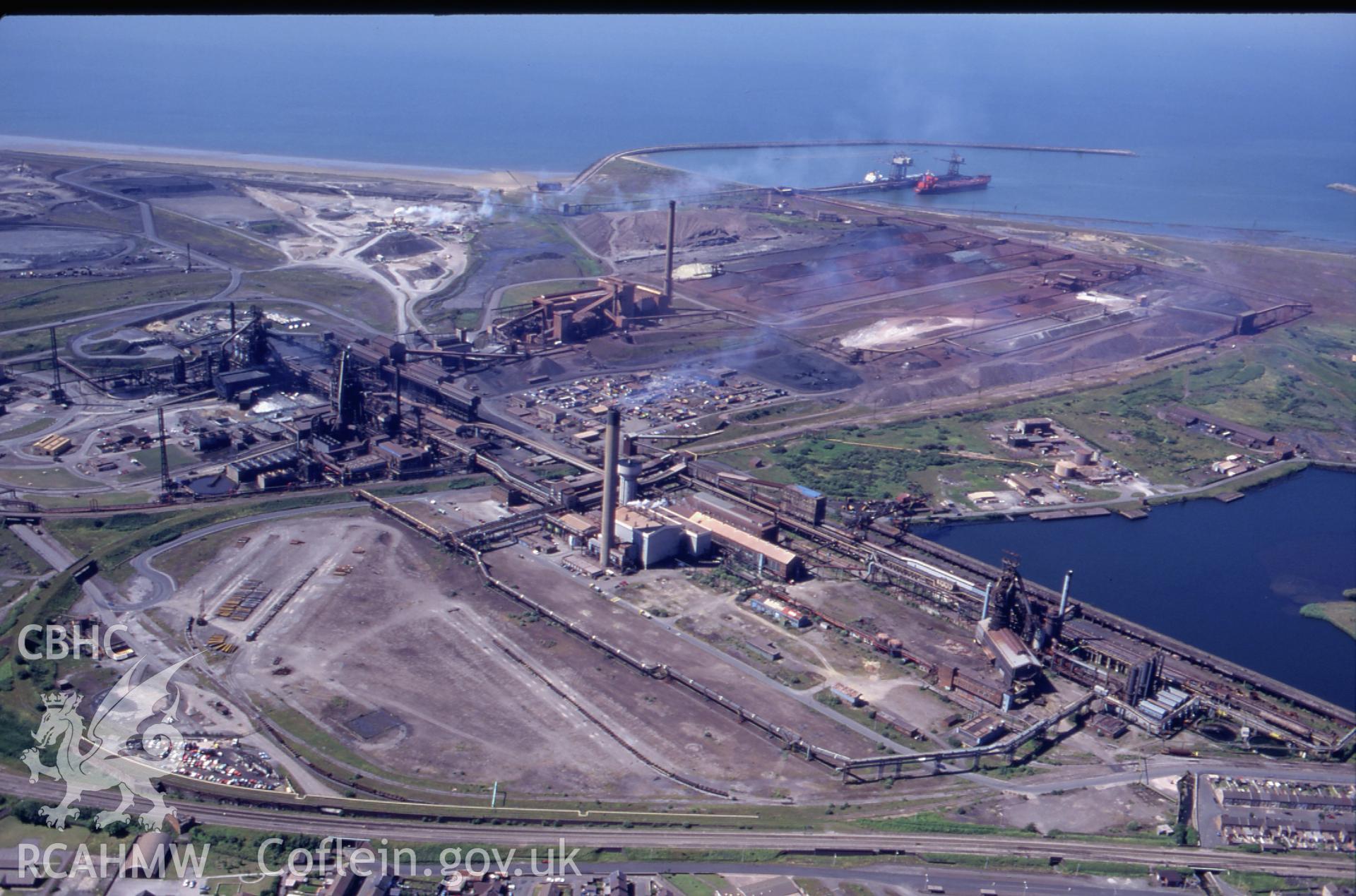 RCAHMW colour slide oblique aerial photograph of Margam Iron and Steel Works, Margam Moors, taken by C.R.Musson on the 17/07/1996