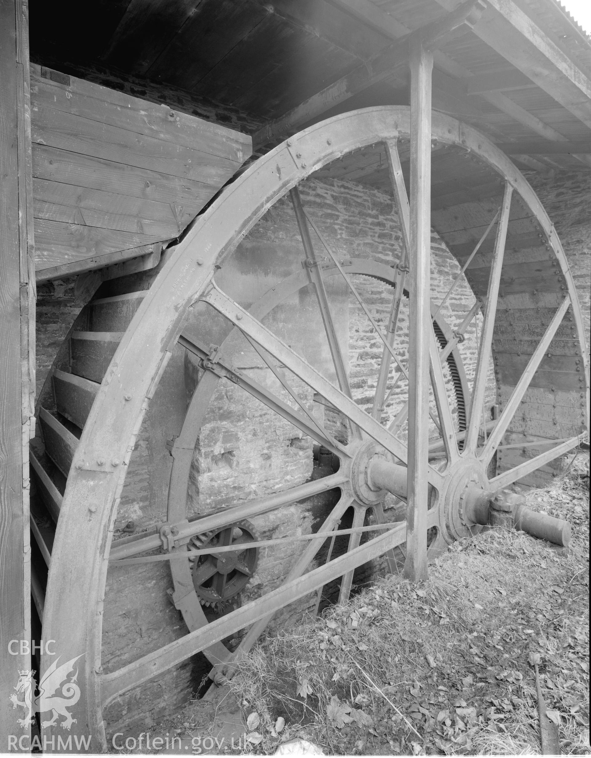 Exterior, cast iron water wheel. NA/GEN/99/028.