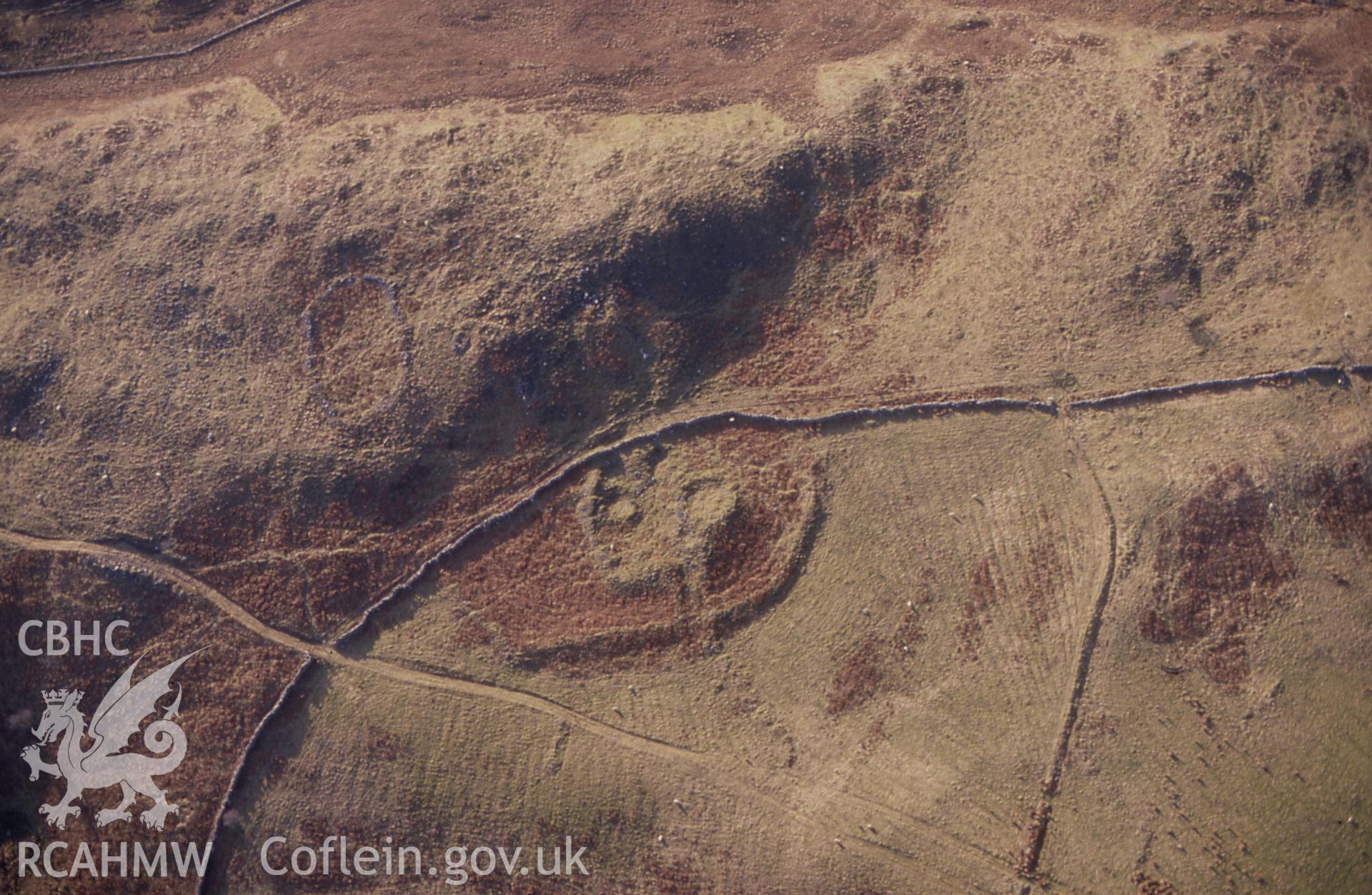 RCAHMW colour slide oblique aerial photograph of Ffridd Bod-y-funddai Settlement, Trawsfynydd, taken on 26/02/1991 by CR Musson