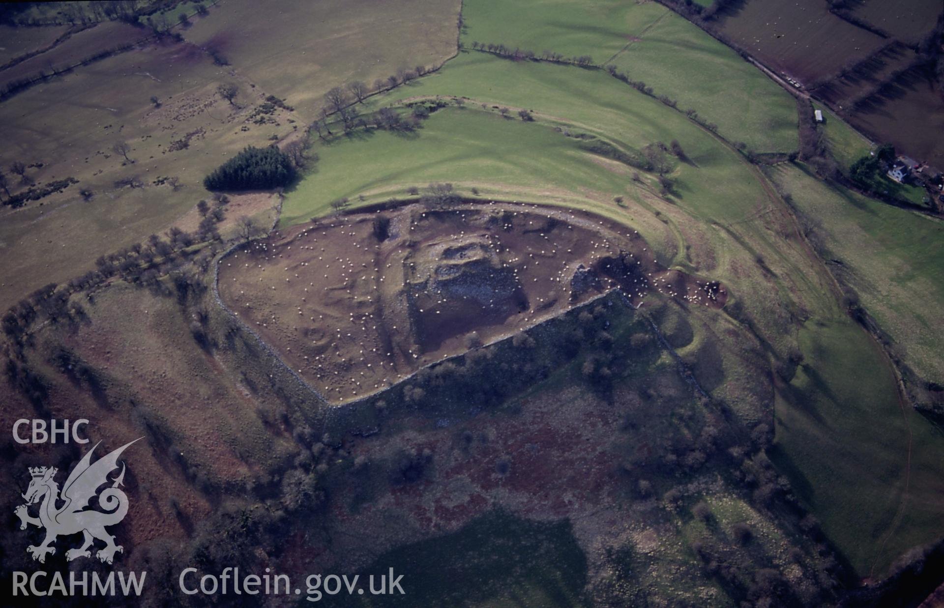 RCAHMW colour slide oblique aerial photograph of Castell Dinas, Talgarth, taken on 15/03/1999 by Toby Driver