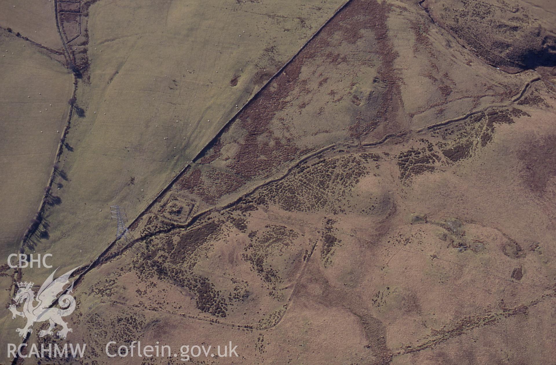 RCAHMW colour slide oblique aerial photograph of Tomen-y-mur SE, Trawsfynydd, taken by C.R.Musson on the 30/03/1996