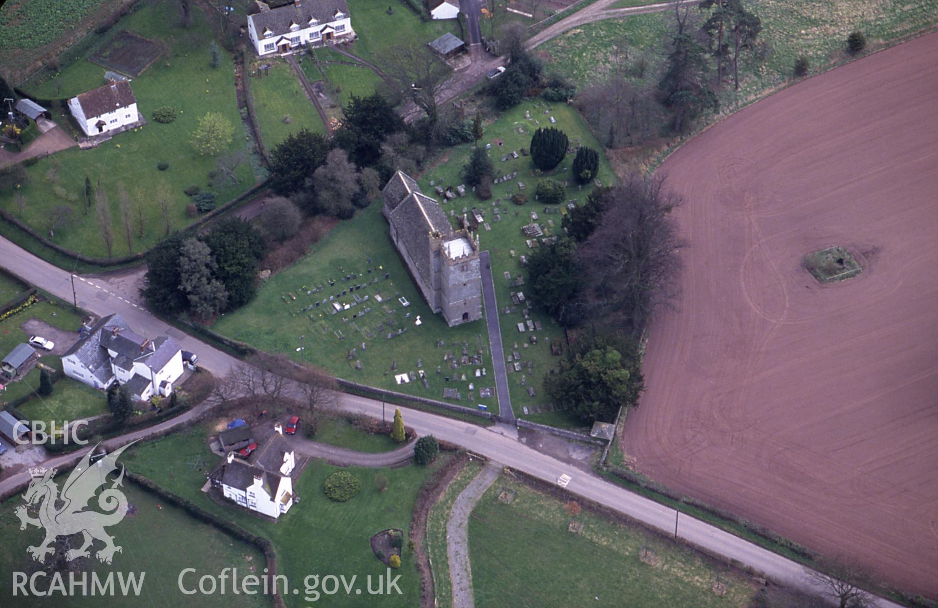 RCAHMW colour slide oblique aerial photograph of St Teilo' Church, Llanarth, taken by C.R. Musson, 24/03/94