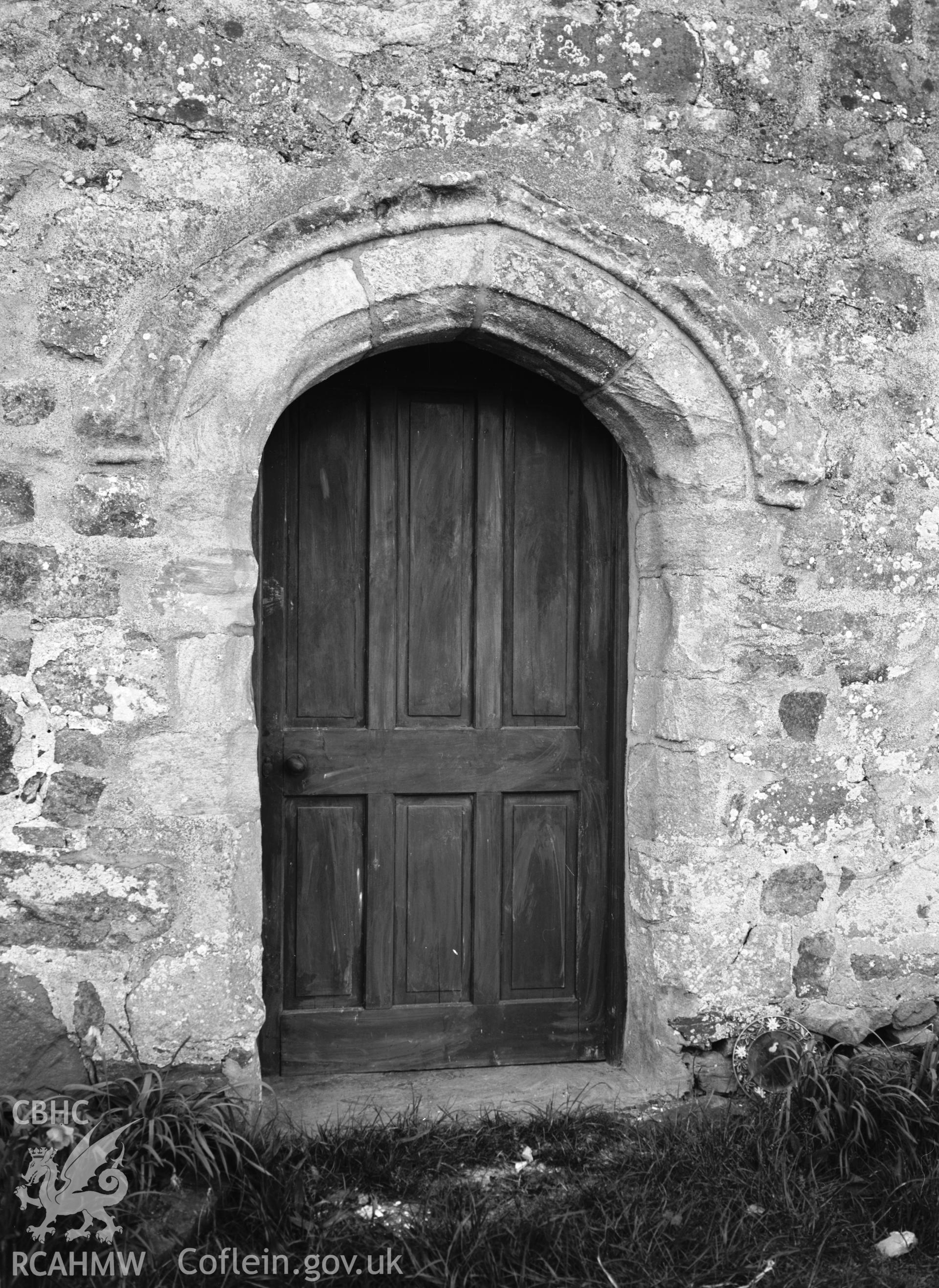 Exterior view showing detail of door in the east elevation.