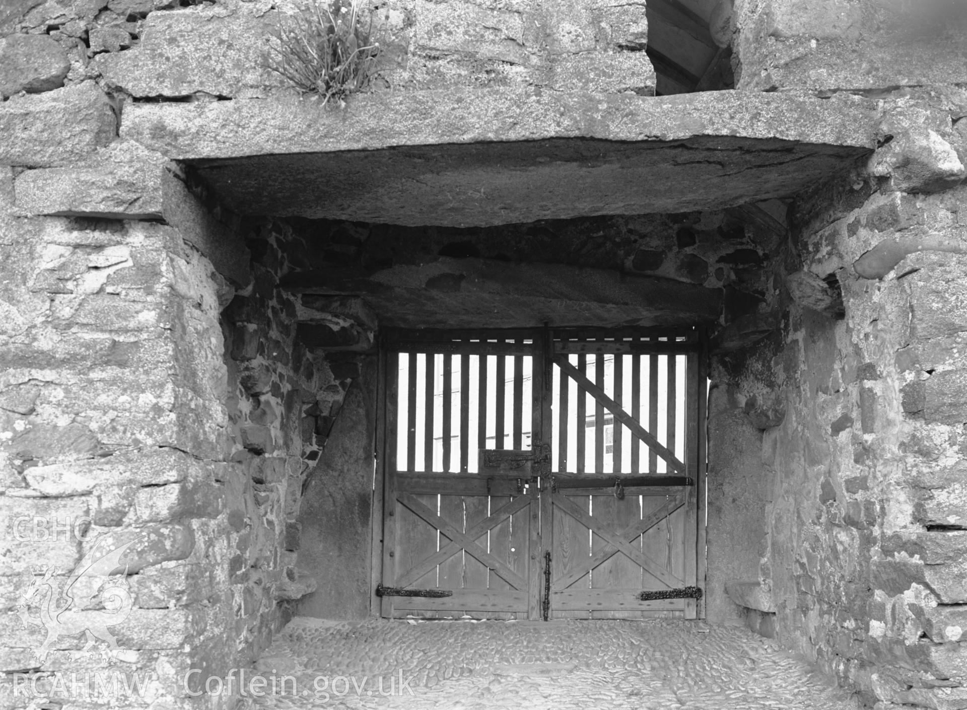 One black and white photograph showing the lych gate from the west.