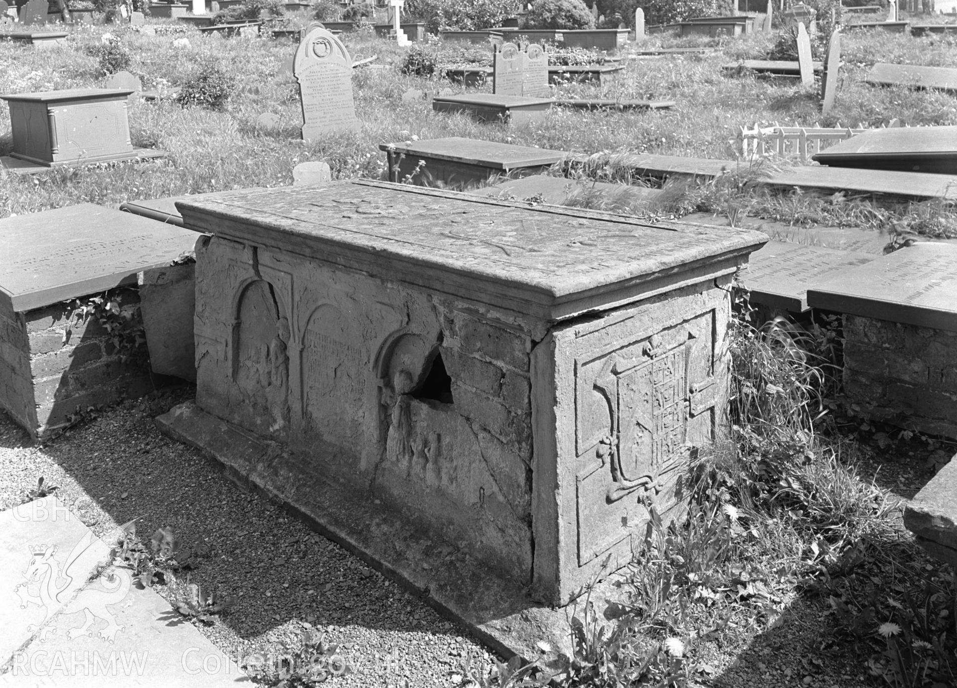 Exterior view showing tomb in the churchyard.