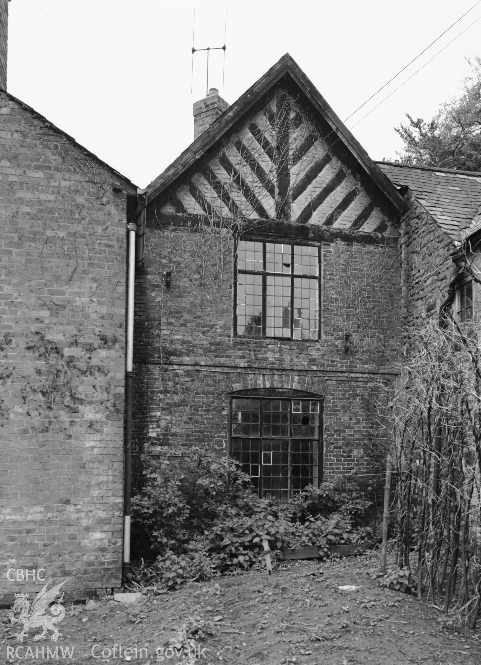 Exterior: one of a pair of timber-framed gables