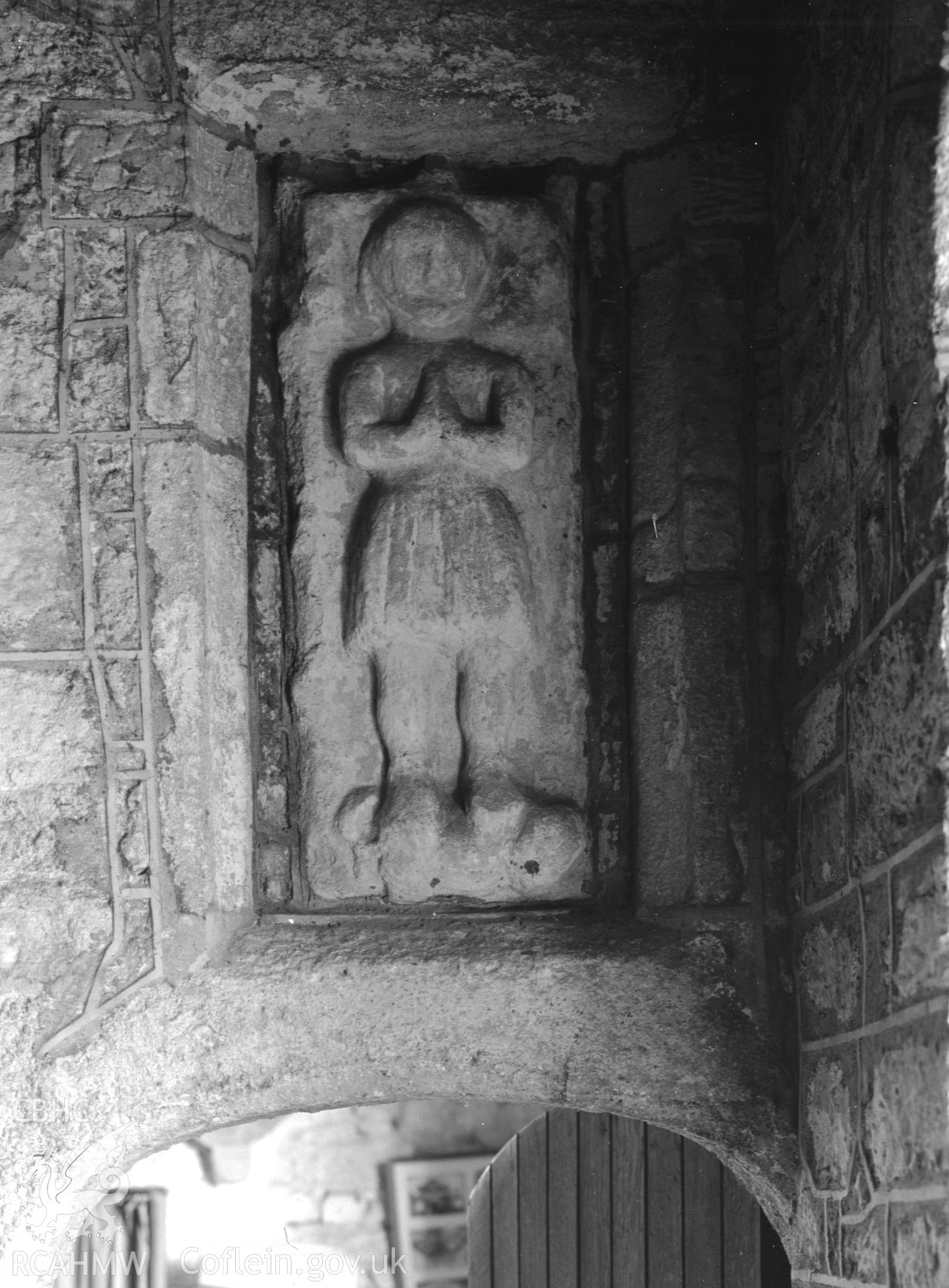 Interior view showing sculptured panel in the organ chamber.