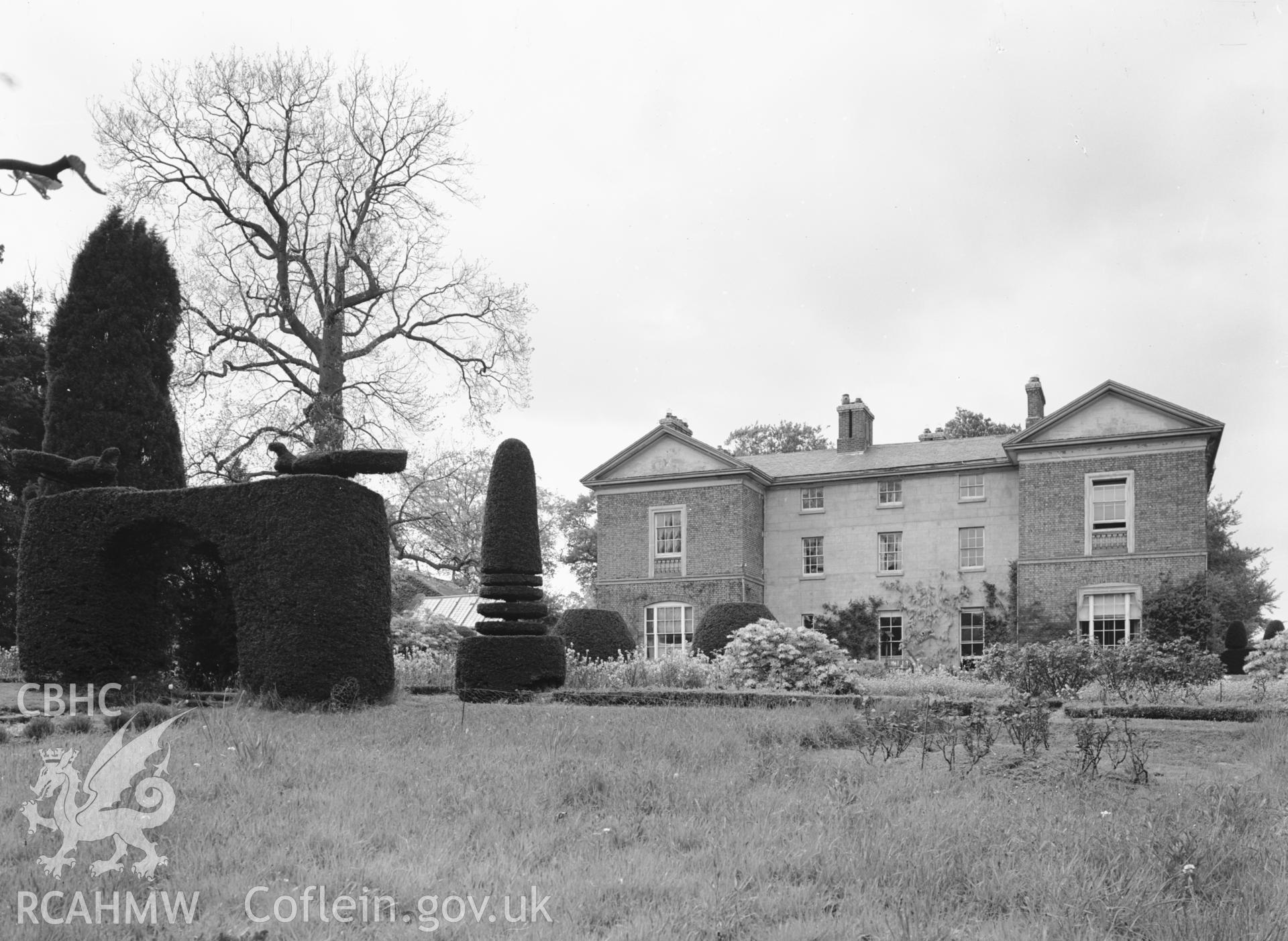 Exterior: S elevation and topiary